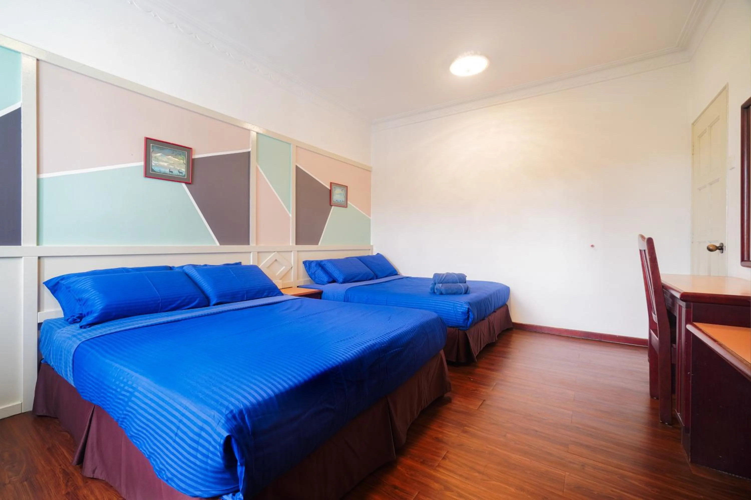 Bed in Parkland Suites