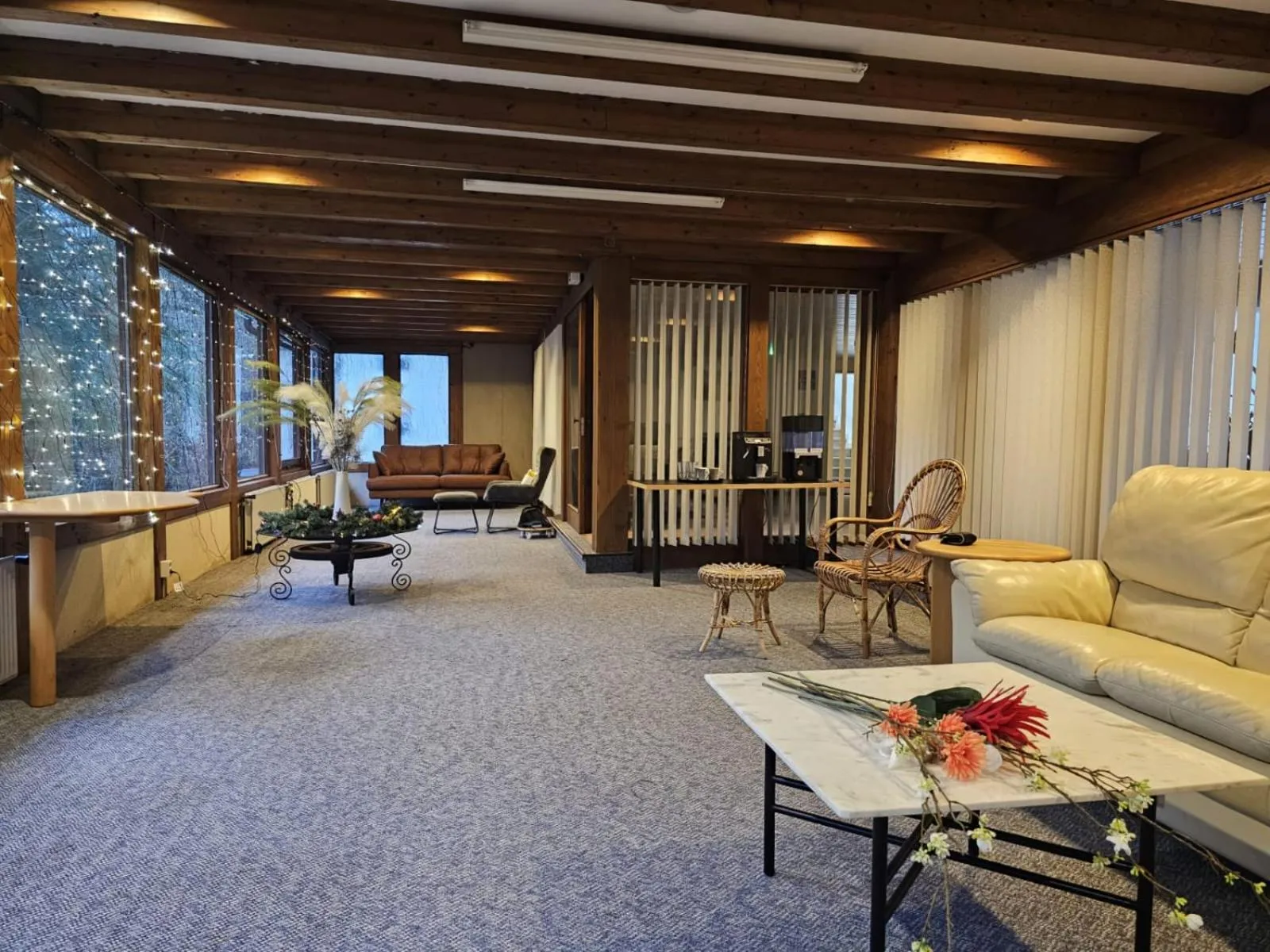 Communal lounge/ TV room in Siegerland-Hotel