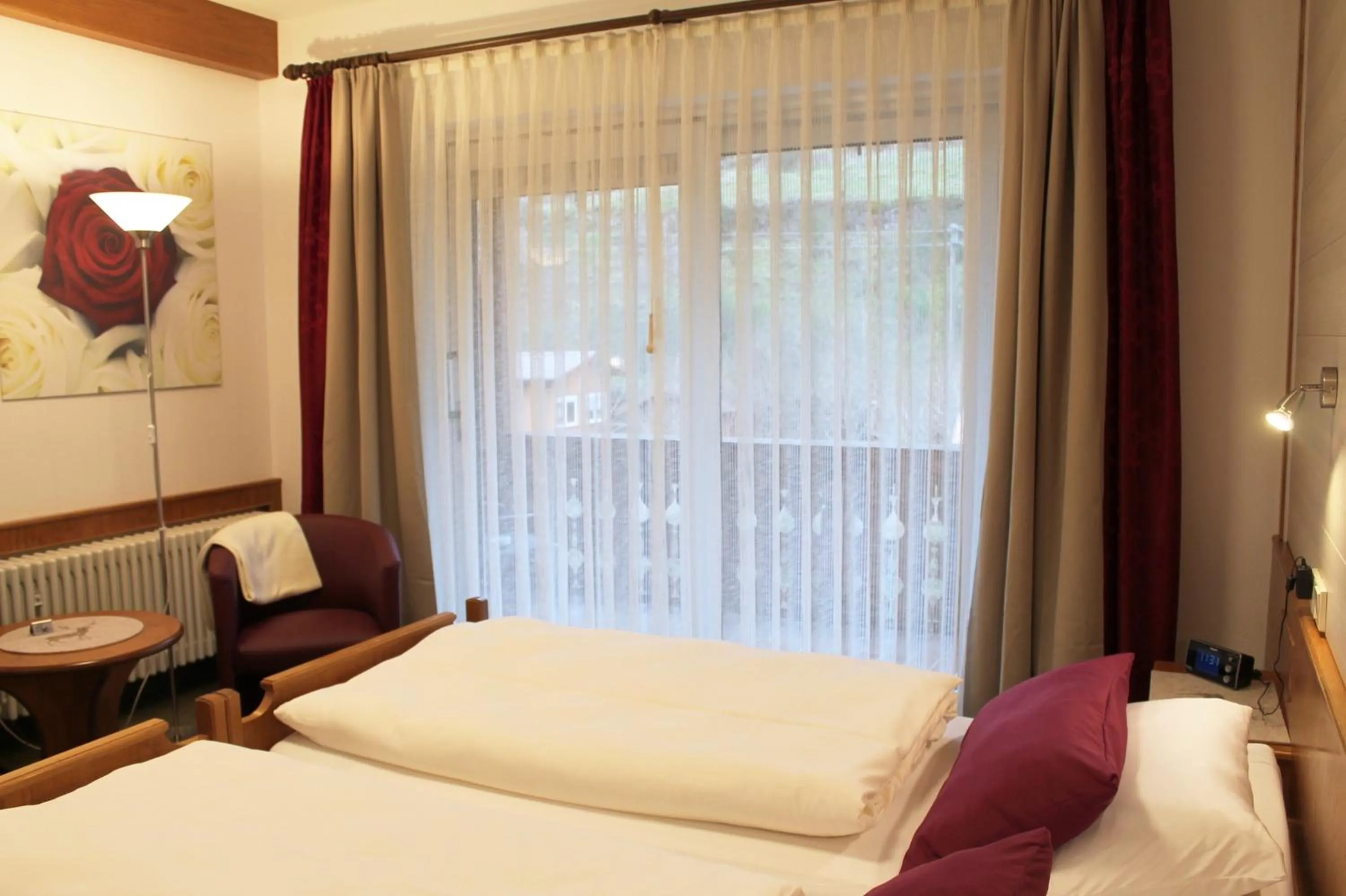 Photo of the whole room, Bed in Landhotel Untere Kapfenhardter Mühle