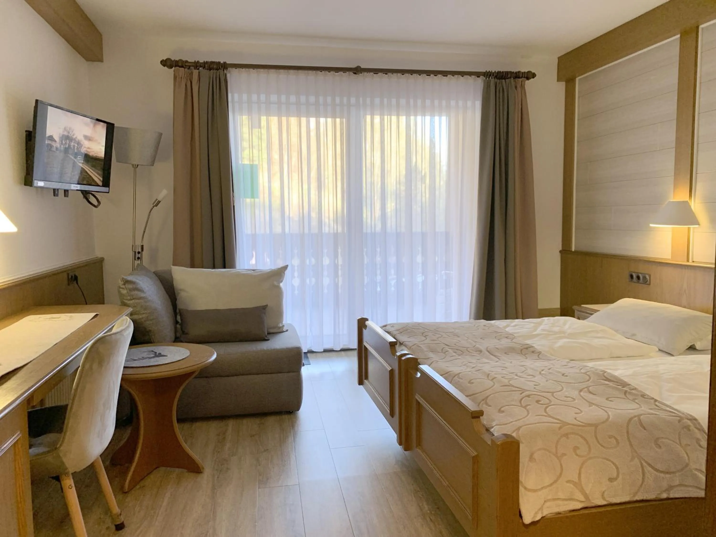 Photo of the whole room, Bed in Landhotel Untere Kapfenhardter Mühle