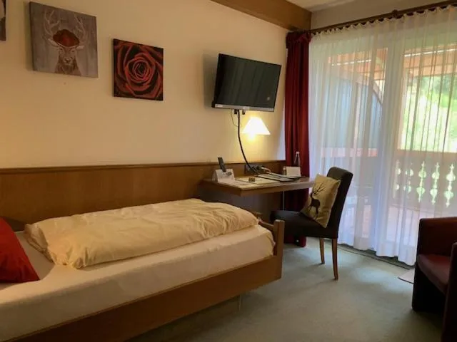 Photo of the whole room, Bed in Landhotel Untere Kapfenhardter Mühle