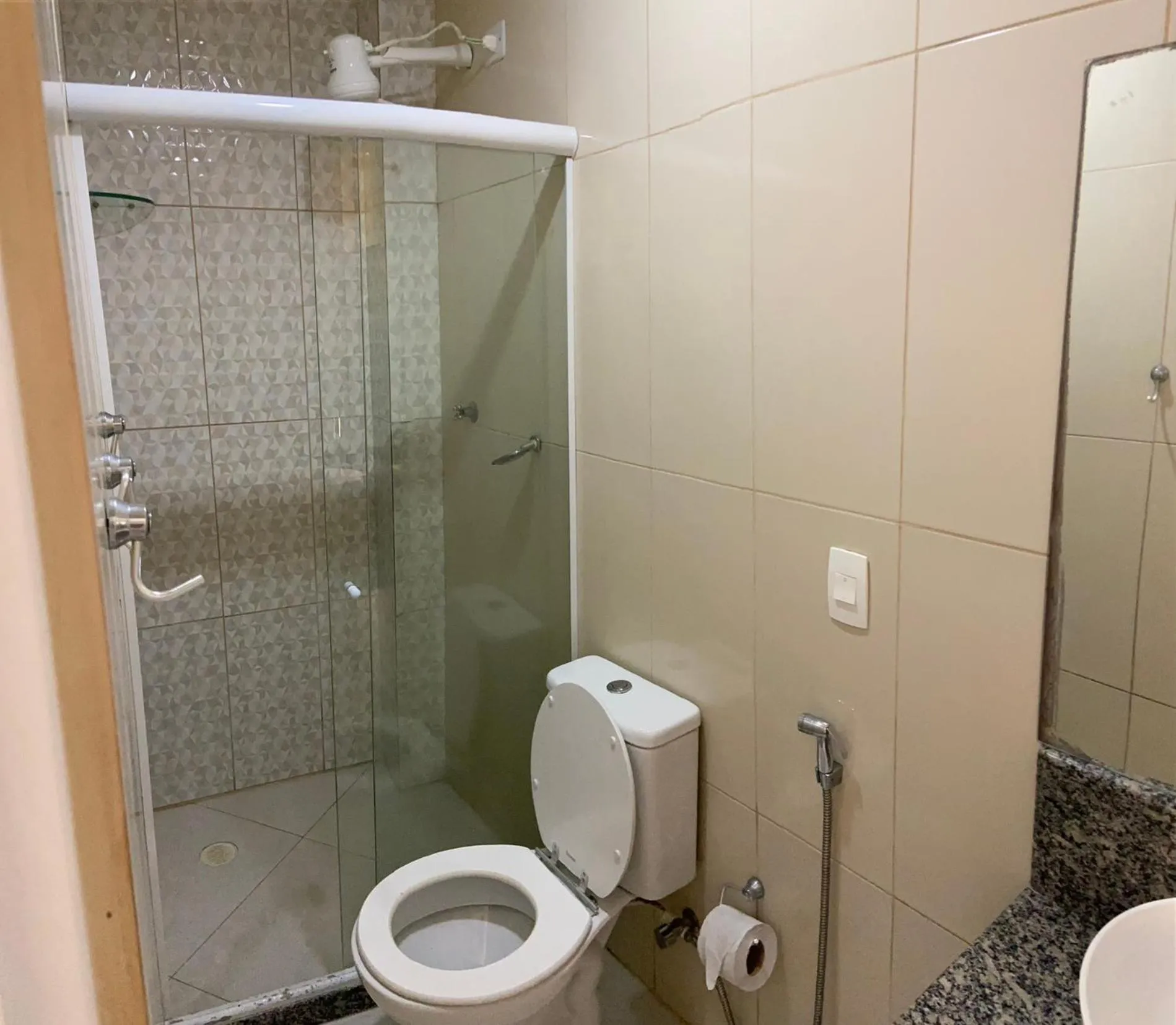 Shower in Pousada Residência dos Sonhos