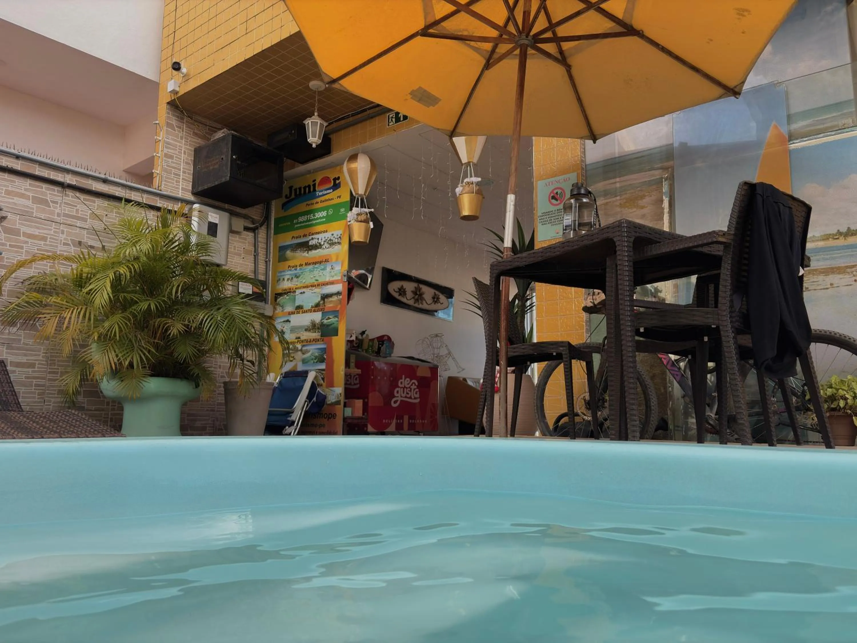 Swimming pool in Pousada Residência dos Sonhos