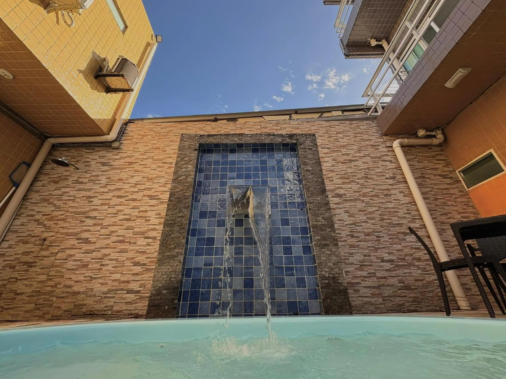 Swimming pool in Pousada Residência dos Sonhos