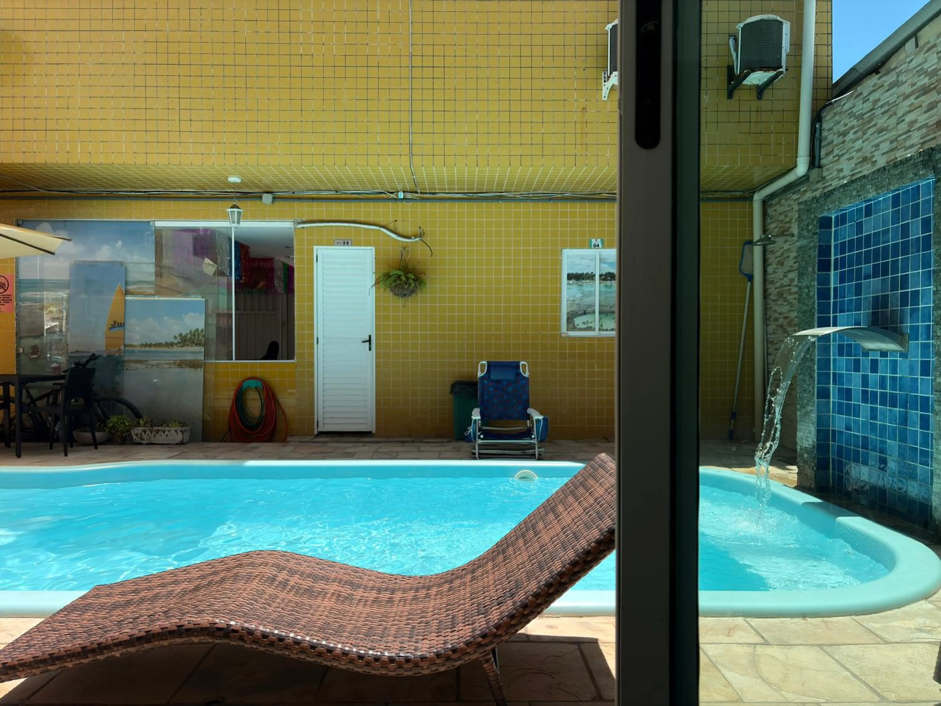Swimming pool in Pousada Residência dos Sonhos