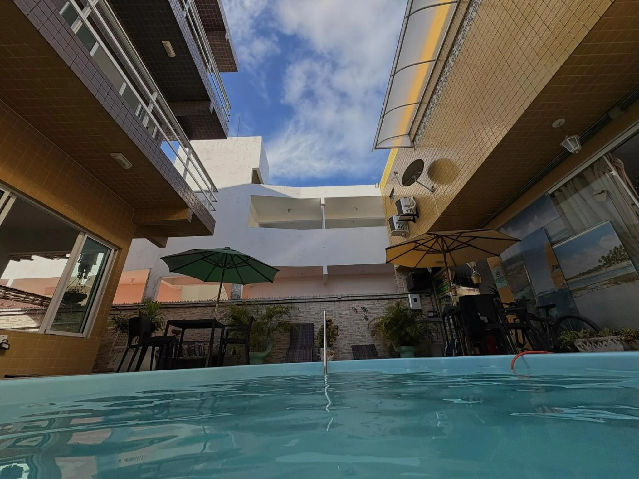 Swimming pool in Pousada Residência dos Sonhos