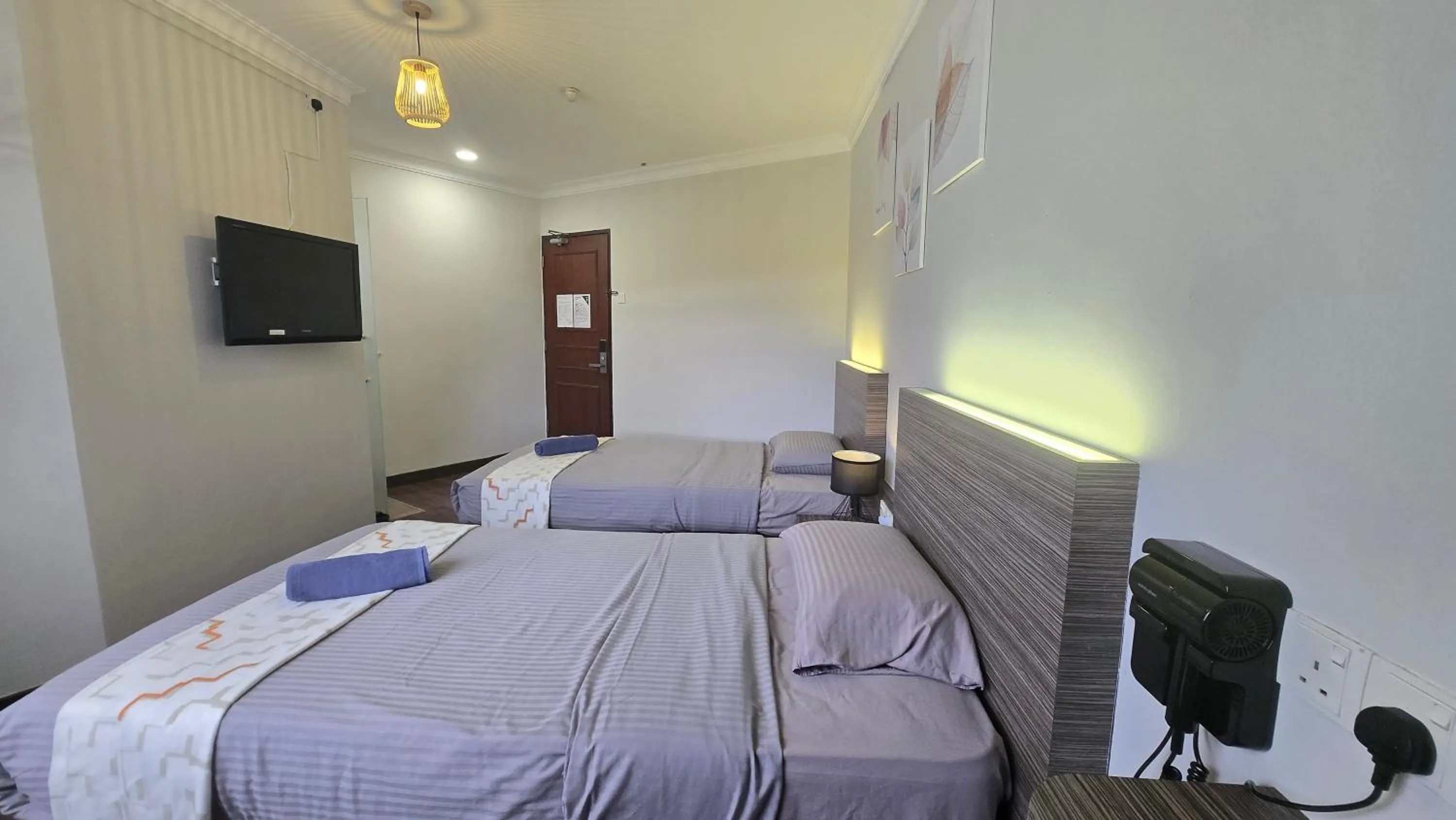 Bed in Parkland Hotel