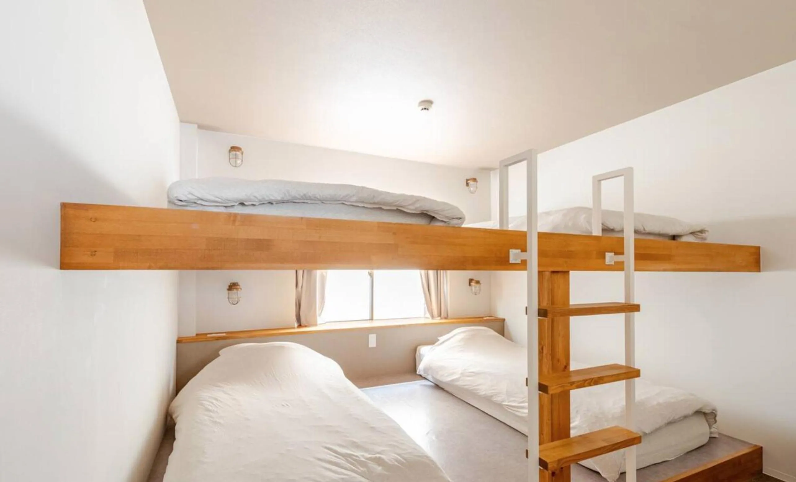 Bed in 8b HOTEL -Osaka Nishikujo APARTMENT-