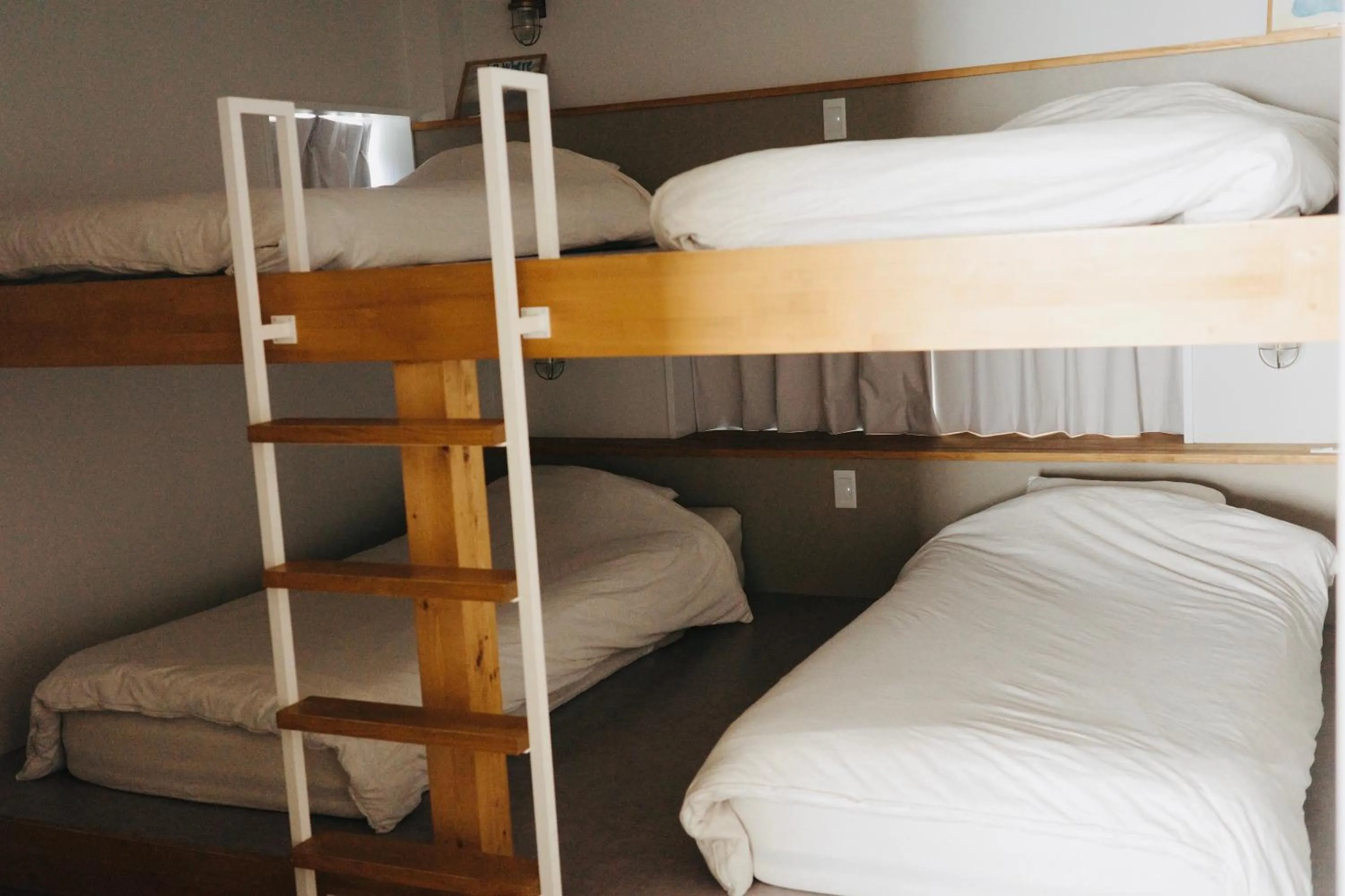 Bed in 8b HOTEL -Osaka Nishikujo APARTMENT-