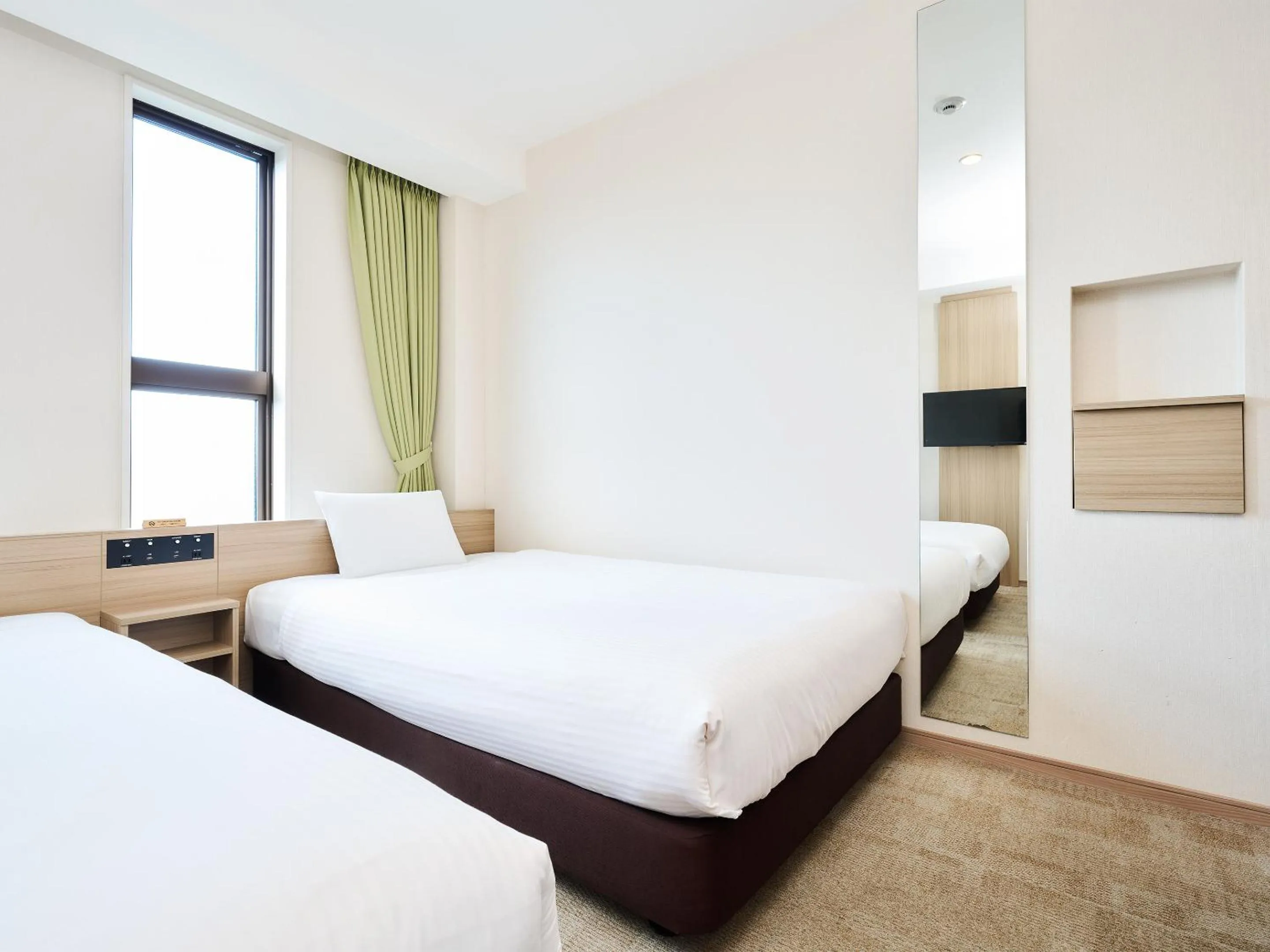 Bed in Hotel Meldia Shijo Kawaramachi Annex