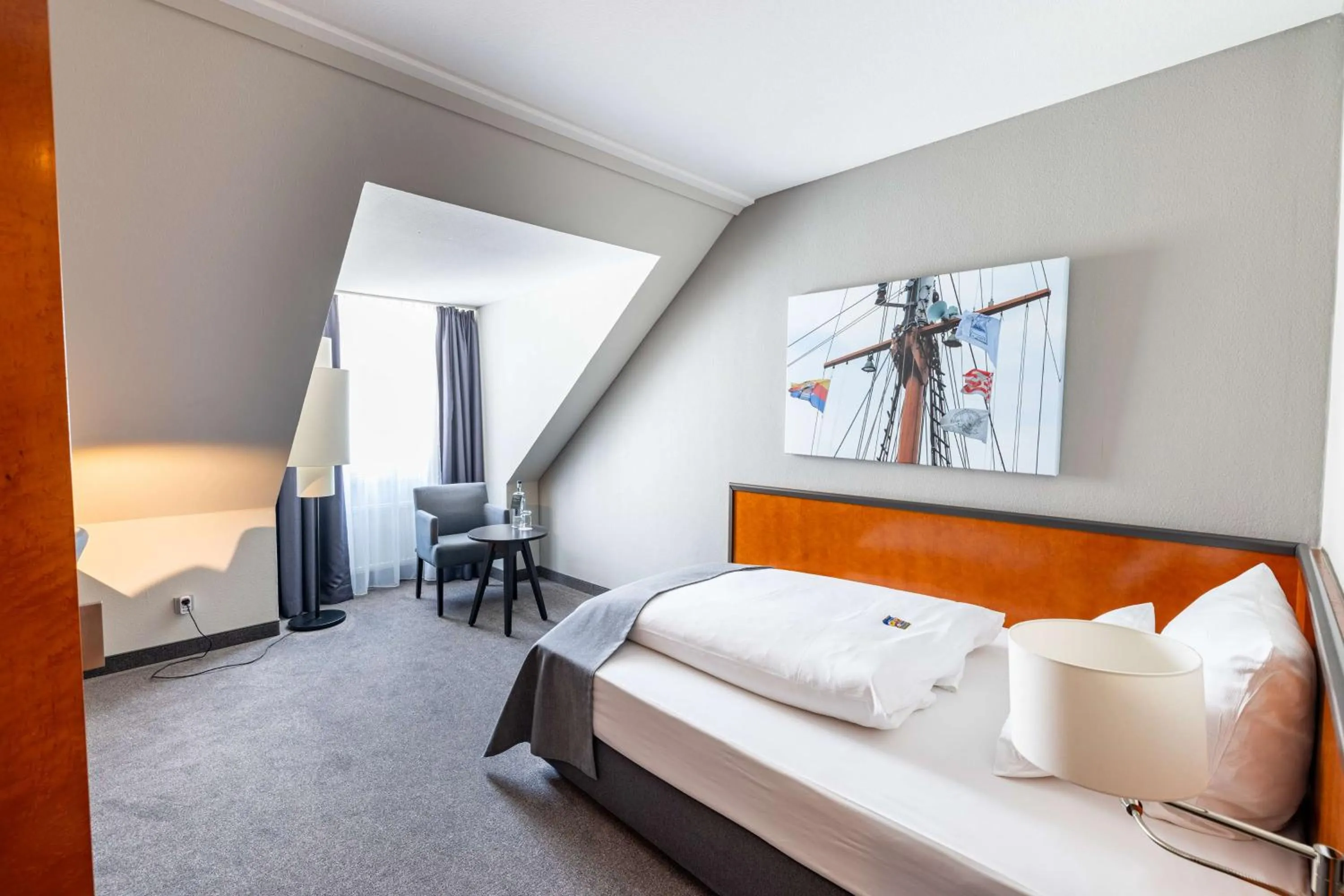 Bedroom, Bed in ATLANTIC Hotel Vegesack
