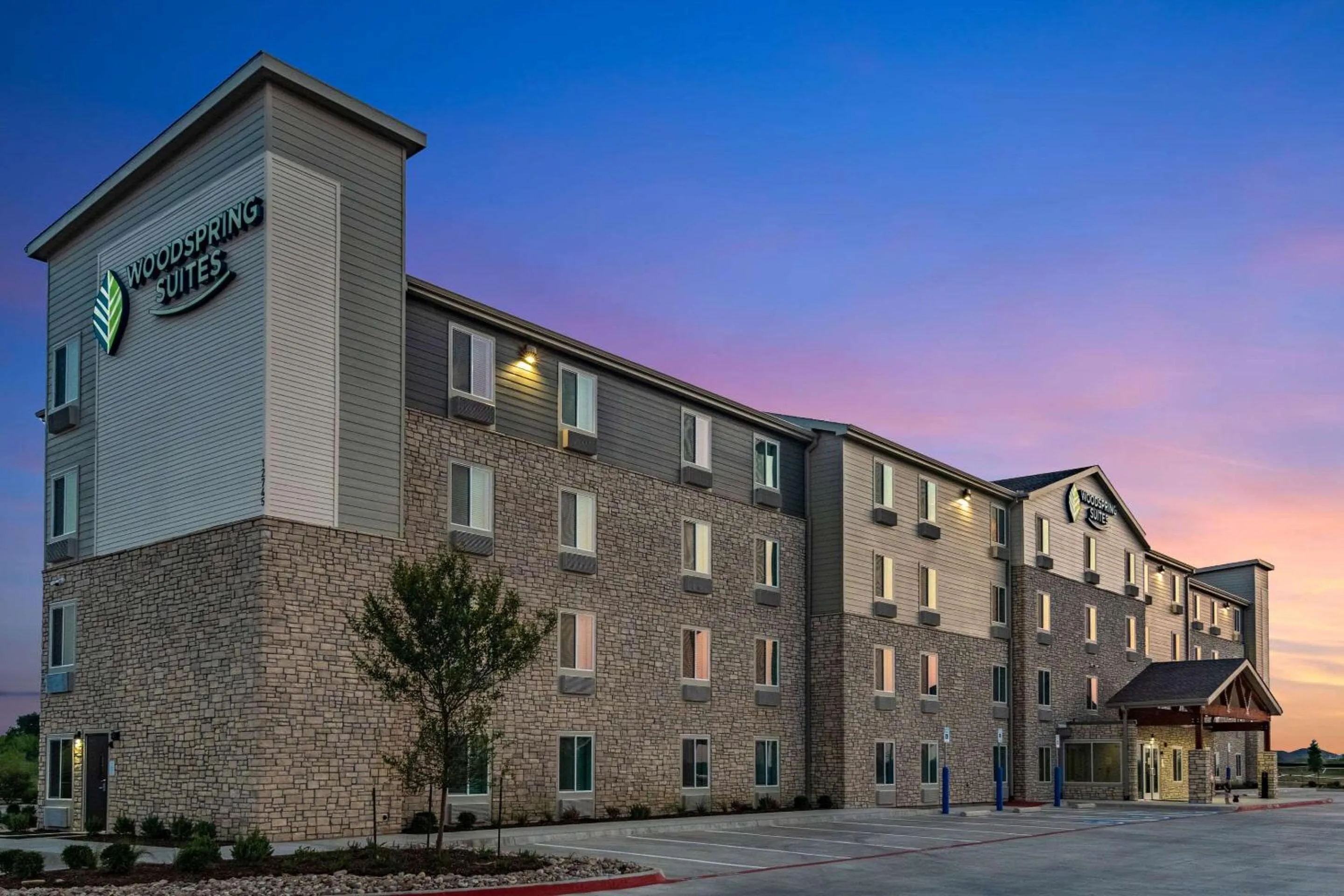 Property building in WoodSpring Suites North Ft Worth Alliance TX Speedway