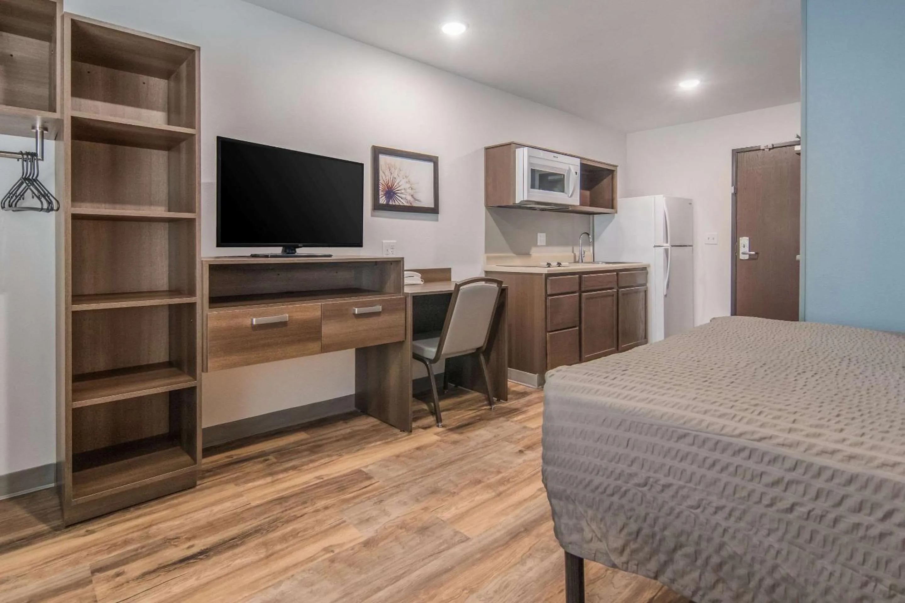 Photo of the whole room in WoodSpring Suites North Ft Worth Alliance TX Speedway