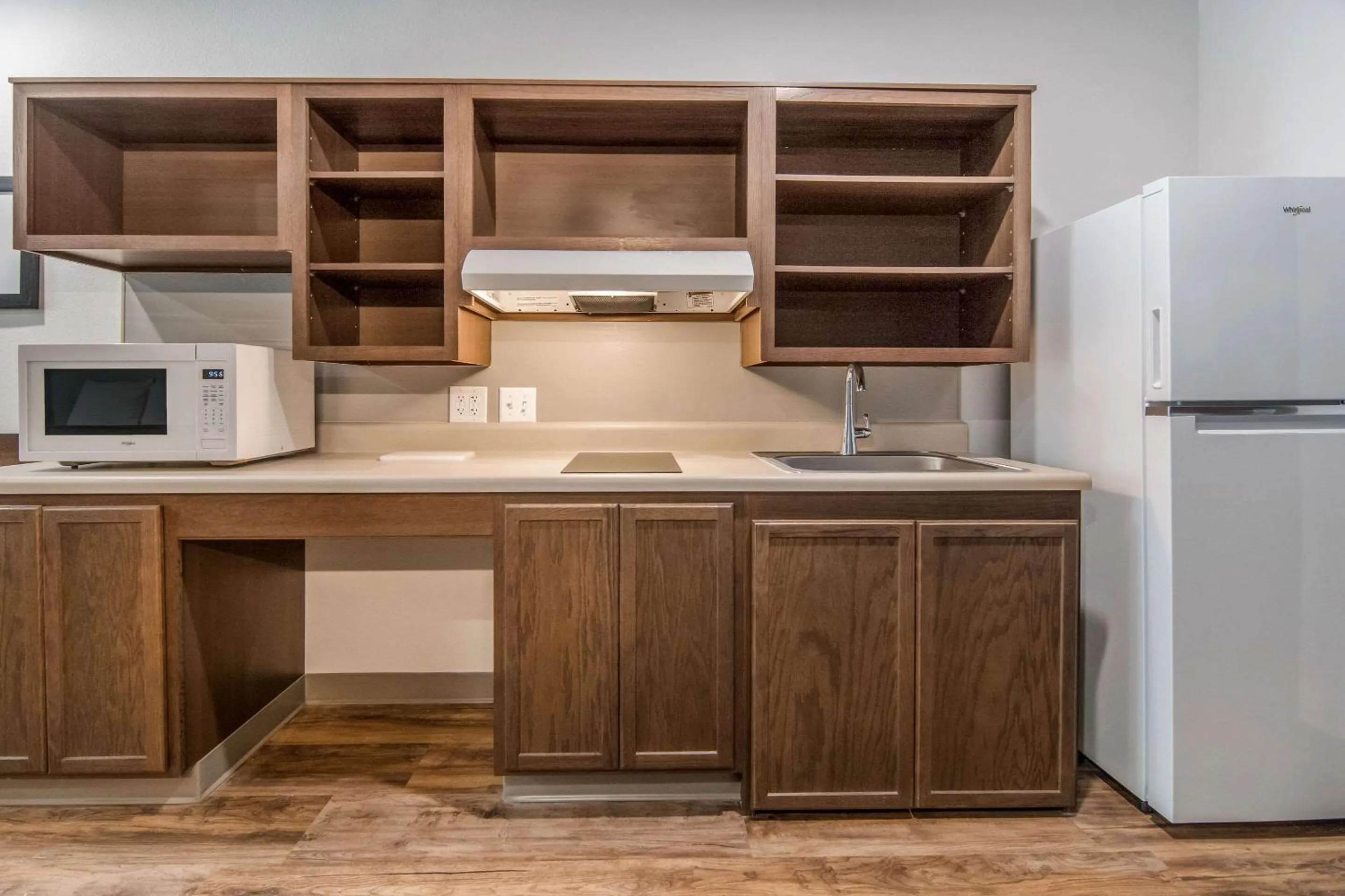 Photo of the whole room in WoodSpring Suites North Ft Worth Alliance TX Speedway