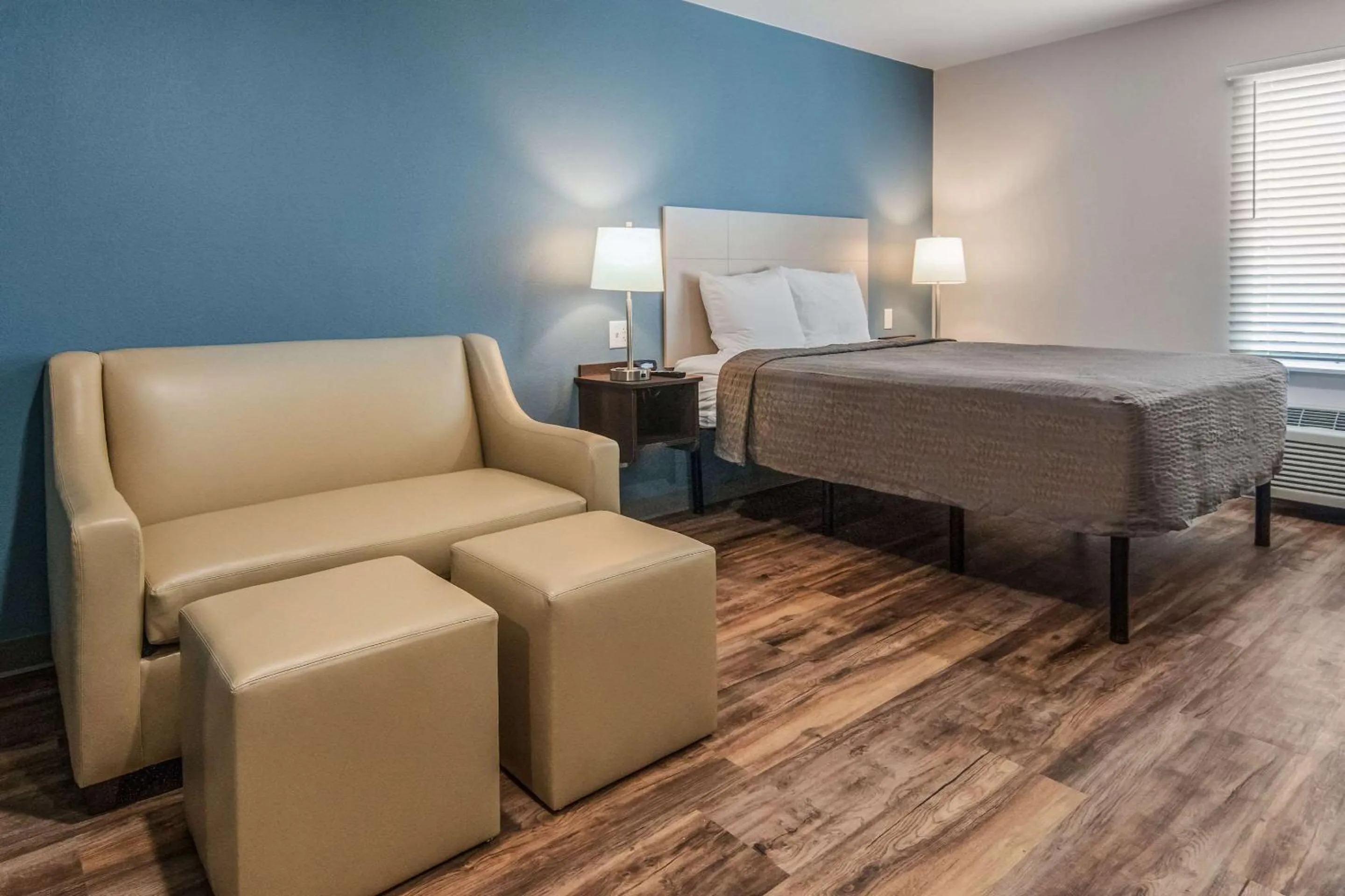 Photo of the whole room, Bed in WoodSpring Suites North Ft Worth Alliance TX Speedway