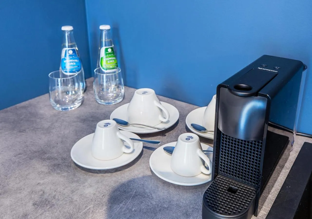 Kitchen or kitchenette in Aparthotel Cracovia Residence