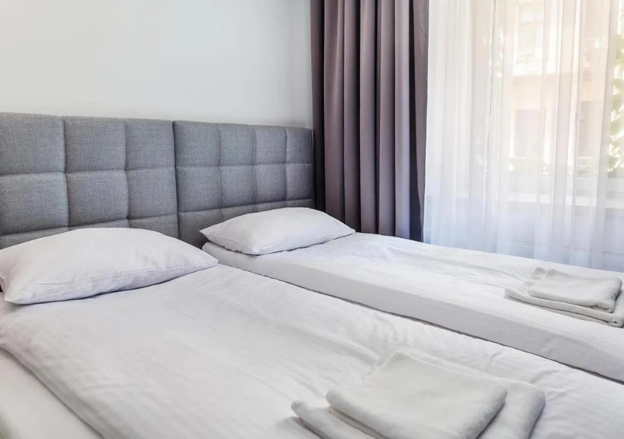 Bed in Aparthotel Cracovia Residence