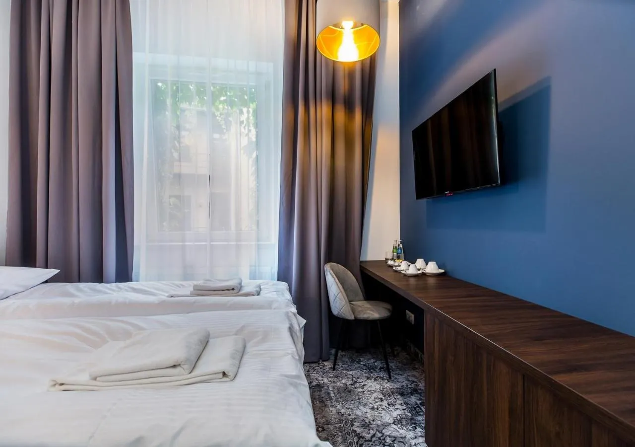 Bed in Aparthotel Cracovia Residence