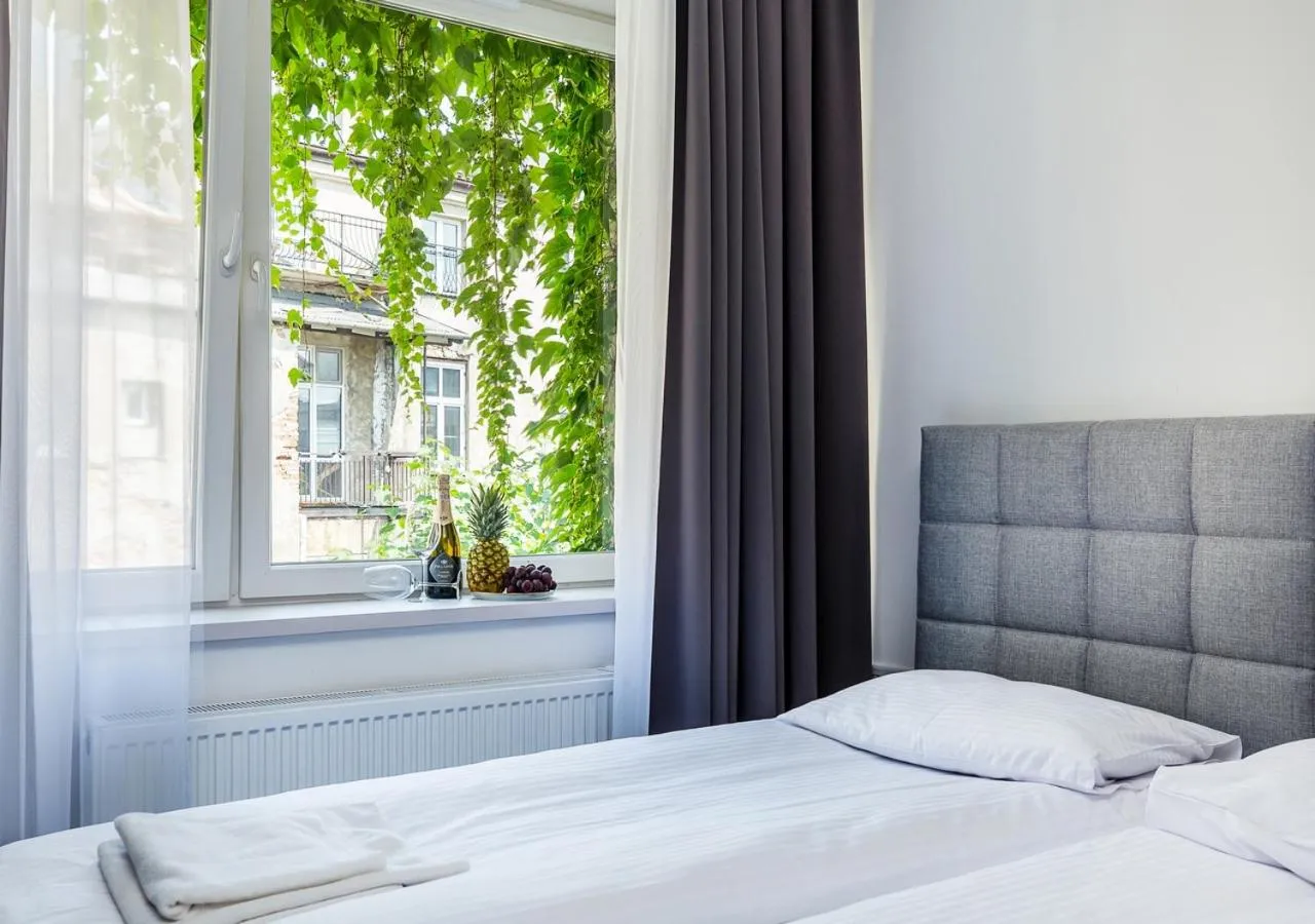 Bed in Aparthotel Cracovia Residence