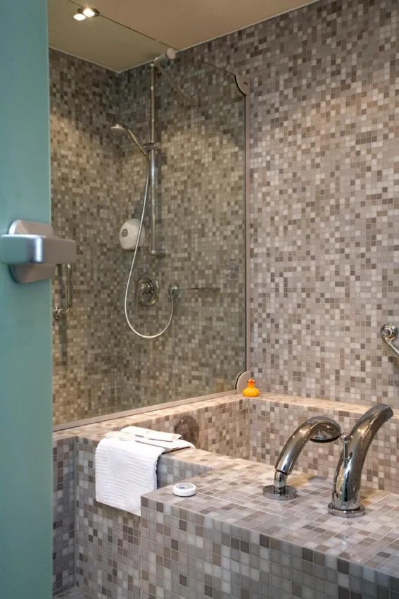 Bathroom in ATLANTIC Hotel Universum