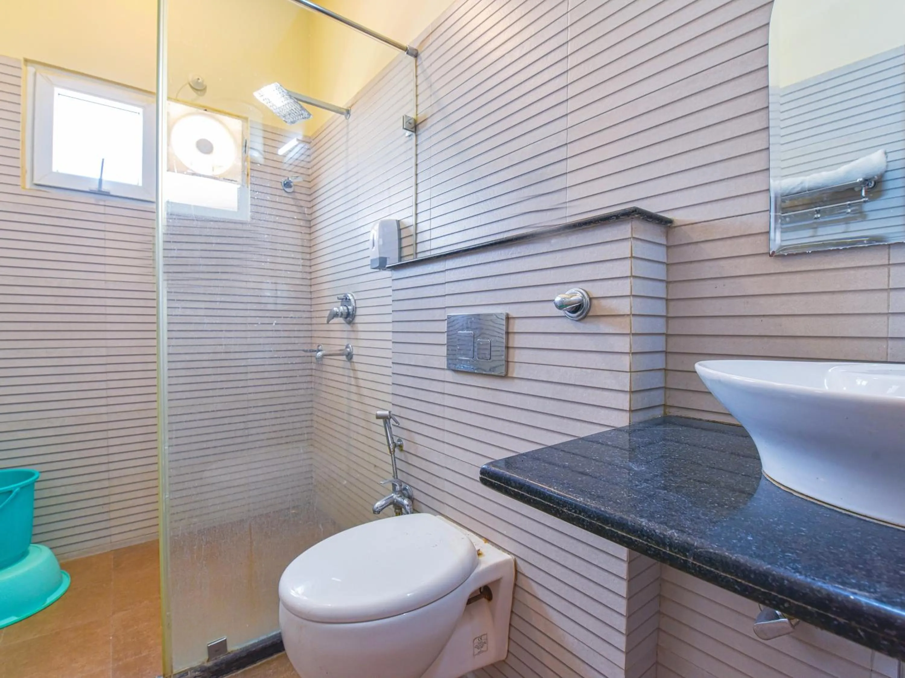 Bathroom in Hotel Anuvibha Malviya Nagar