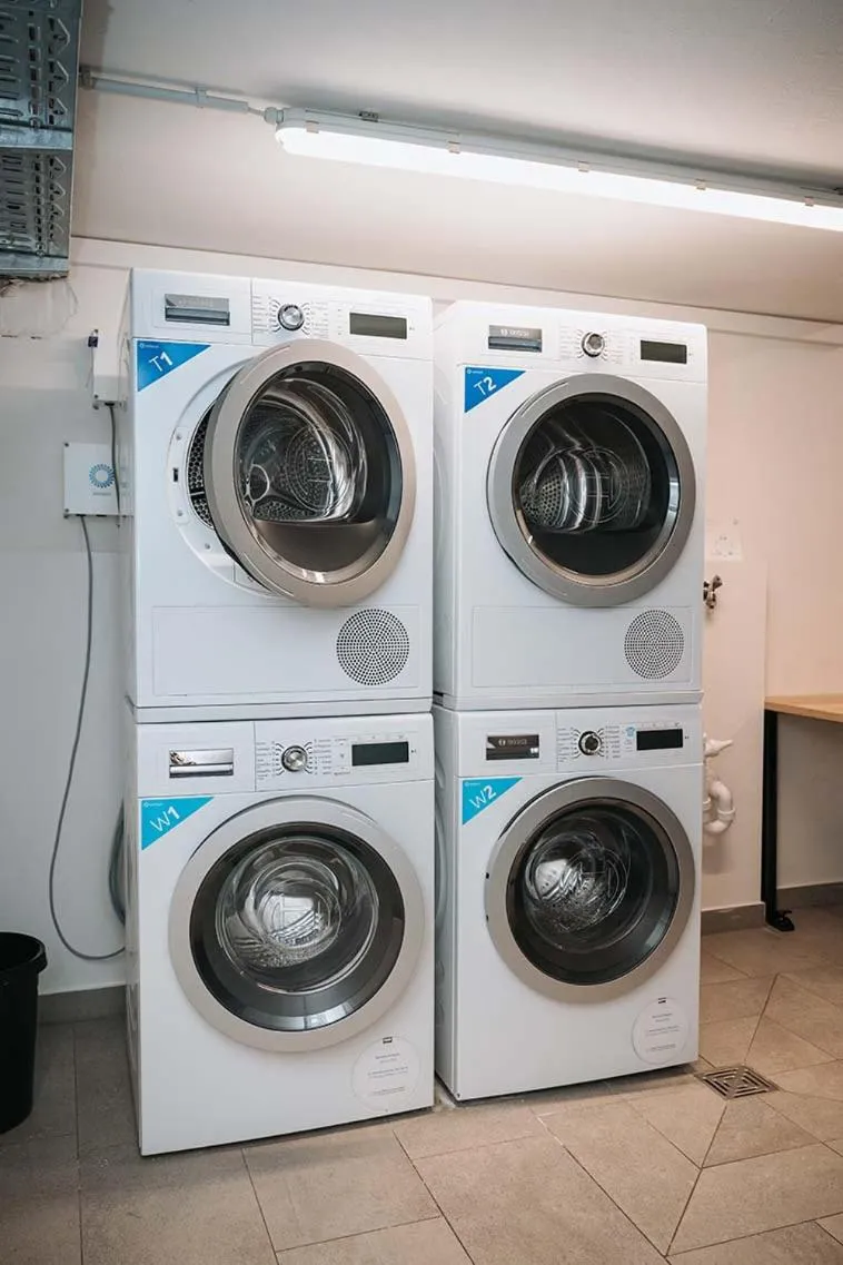 washing machine in Coffee Fellows Hotel & Longstay