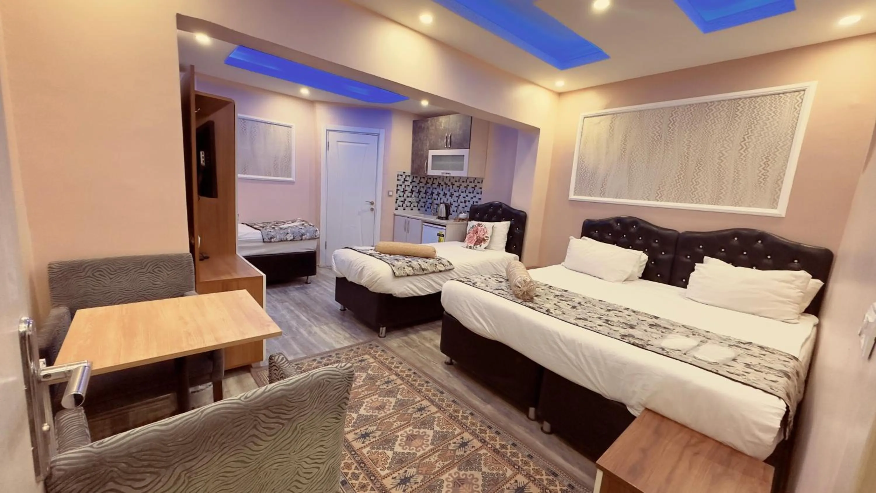 Bed in Mitra Downtown Hotel