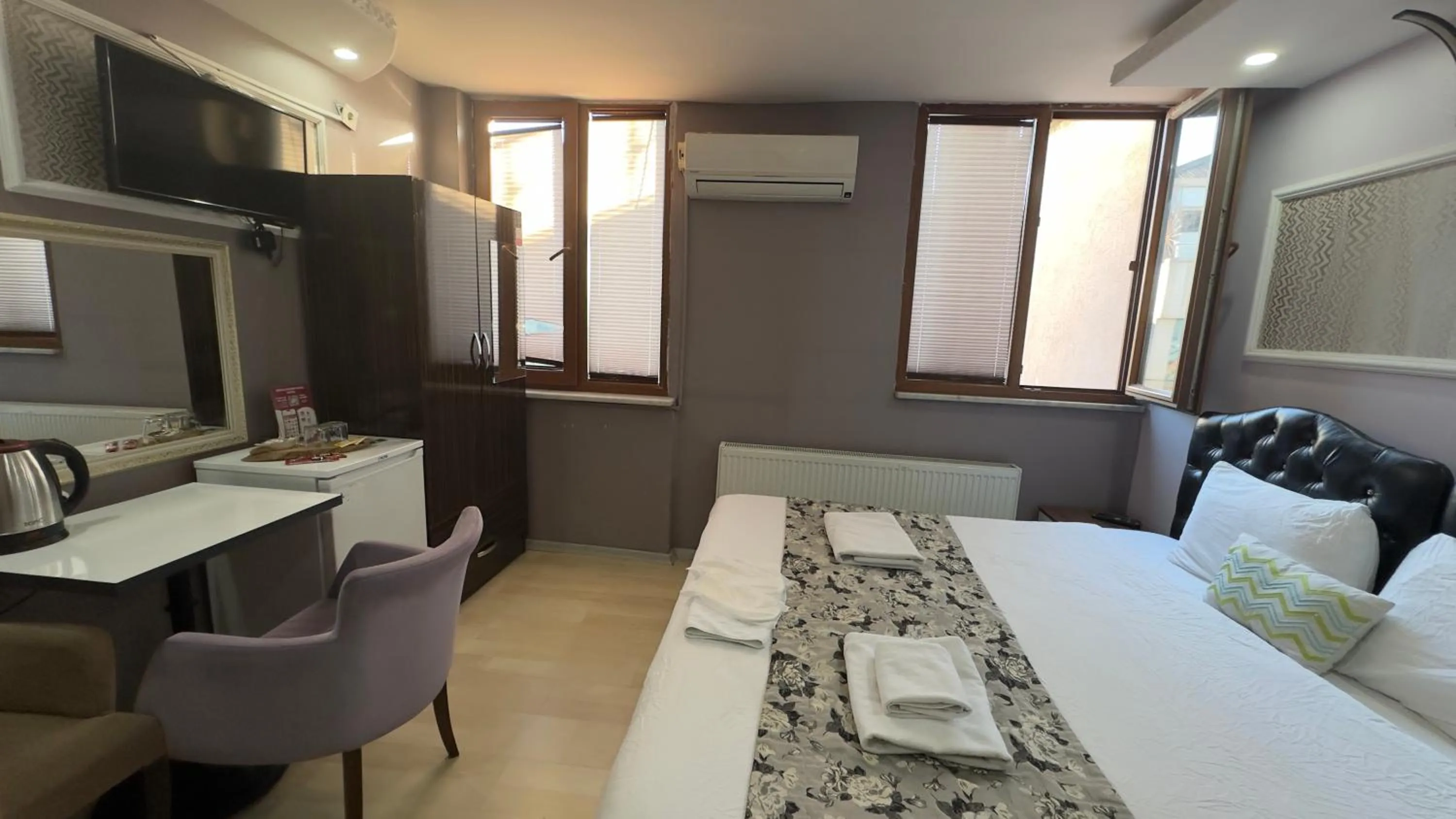 Bed in Mitra Downtown Hotel