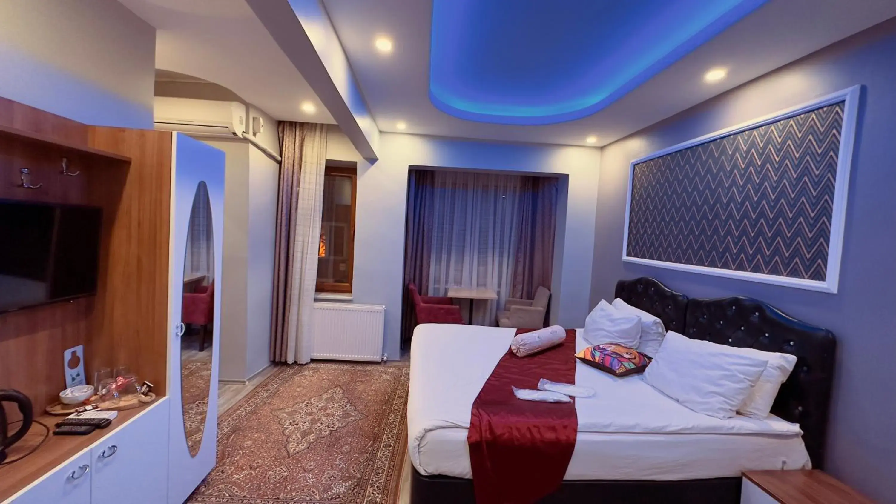 Bed in Mitra Downtown Hotel Bed in Mitra Downtown Hotel