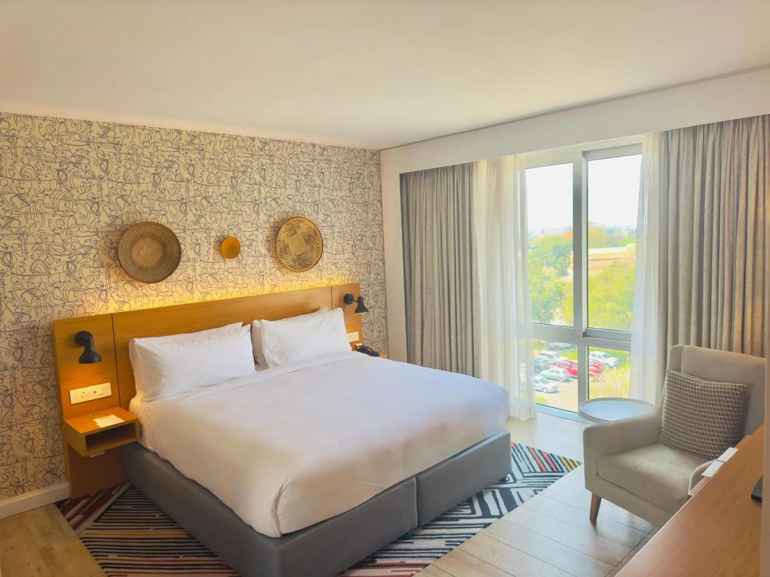 Quiet street view, Bed in Holiday Inn - Lusaka by IHG Quiet street view, Bed in Holiday Inn - Lusaka by IHG