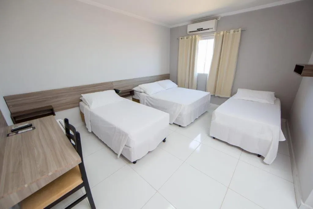 Bed in PUMMA BUDGET HOTEL