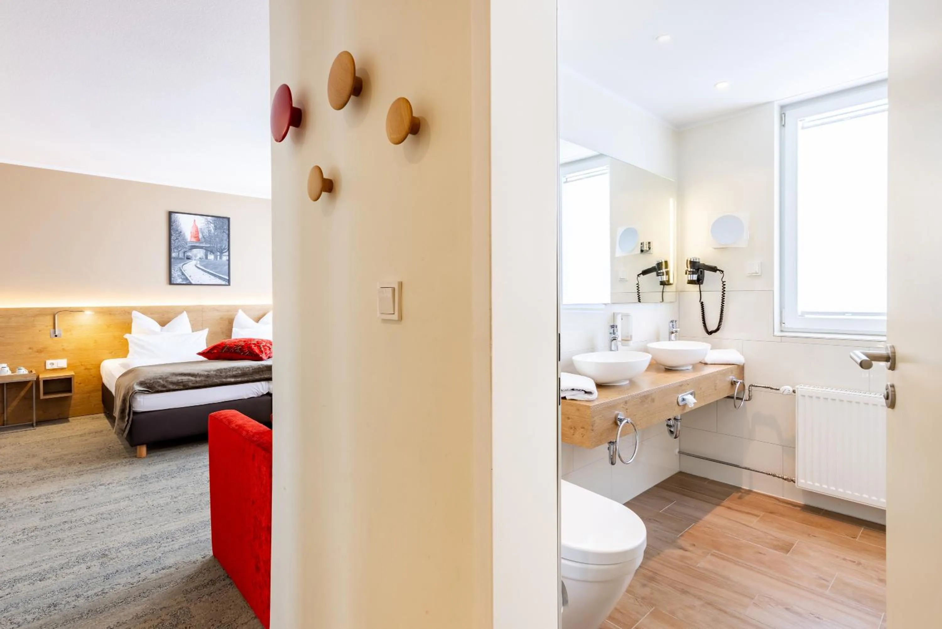 Bathroom, Bed in Maingau Hotel