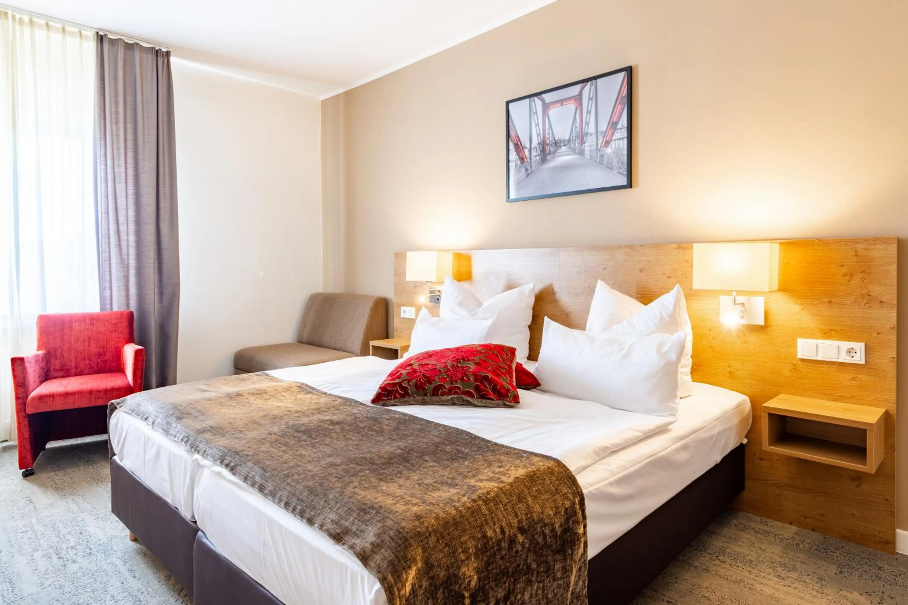 Bed in Maingau Hotel