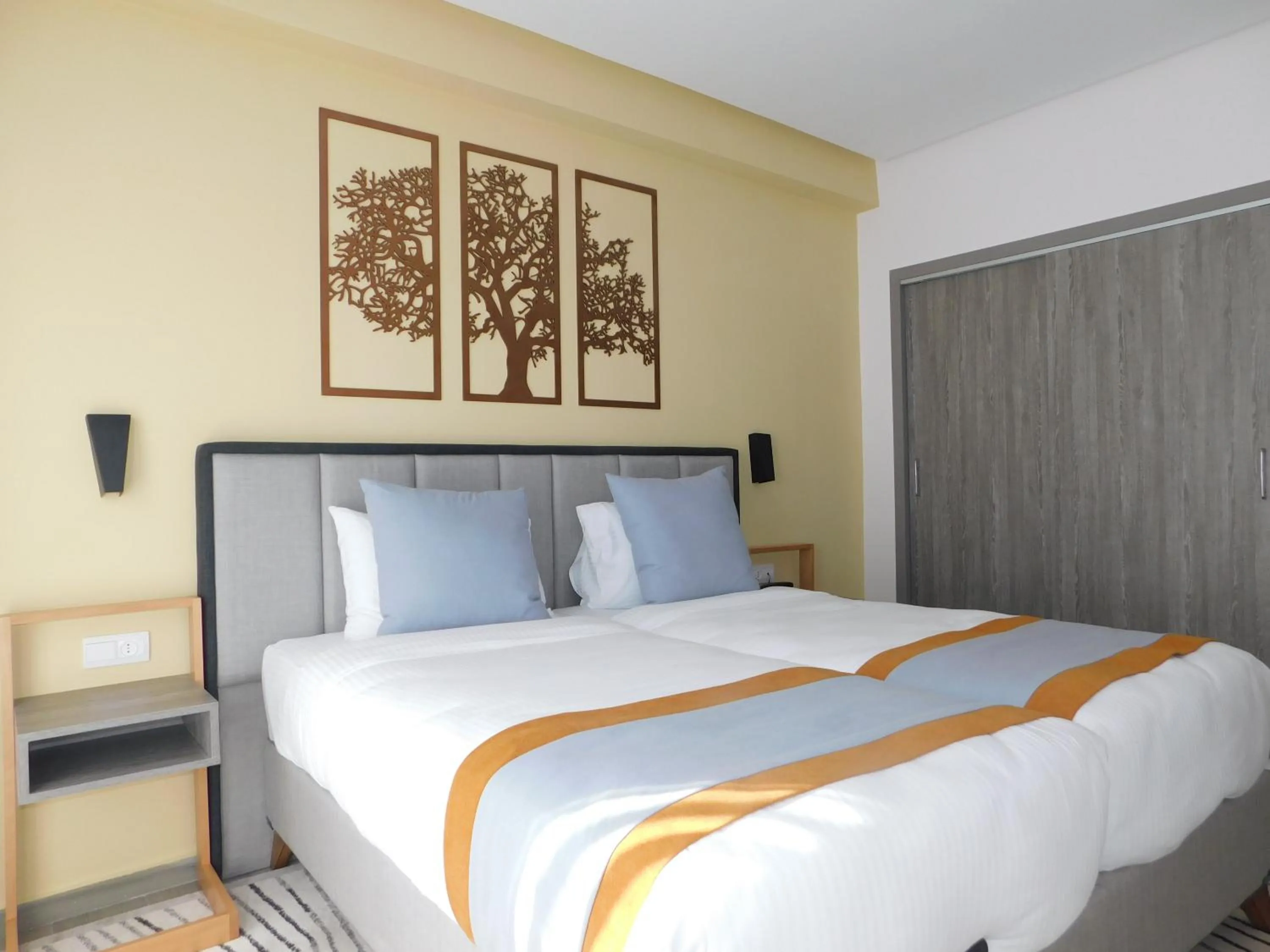 Bed in Gardenia Boutique Hotel