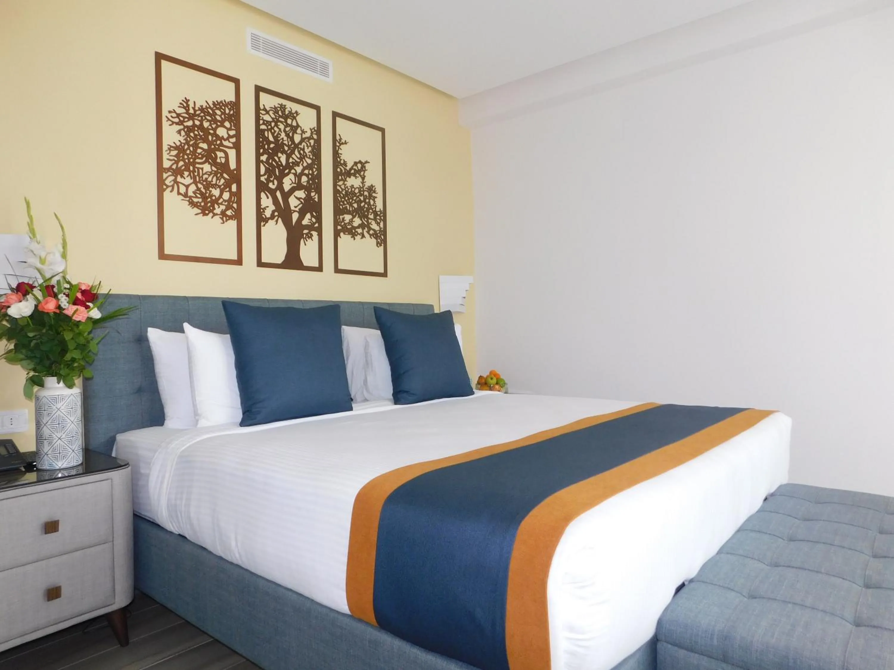 Bed in Gardenia Boutique Hotel