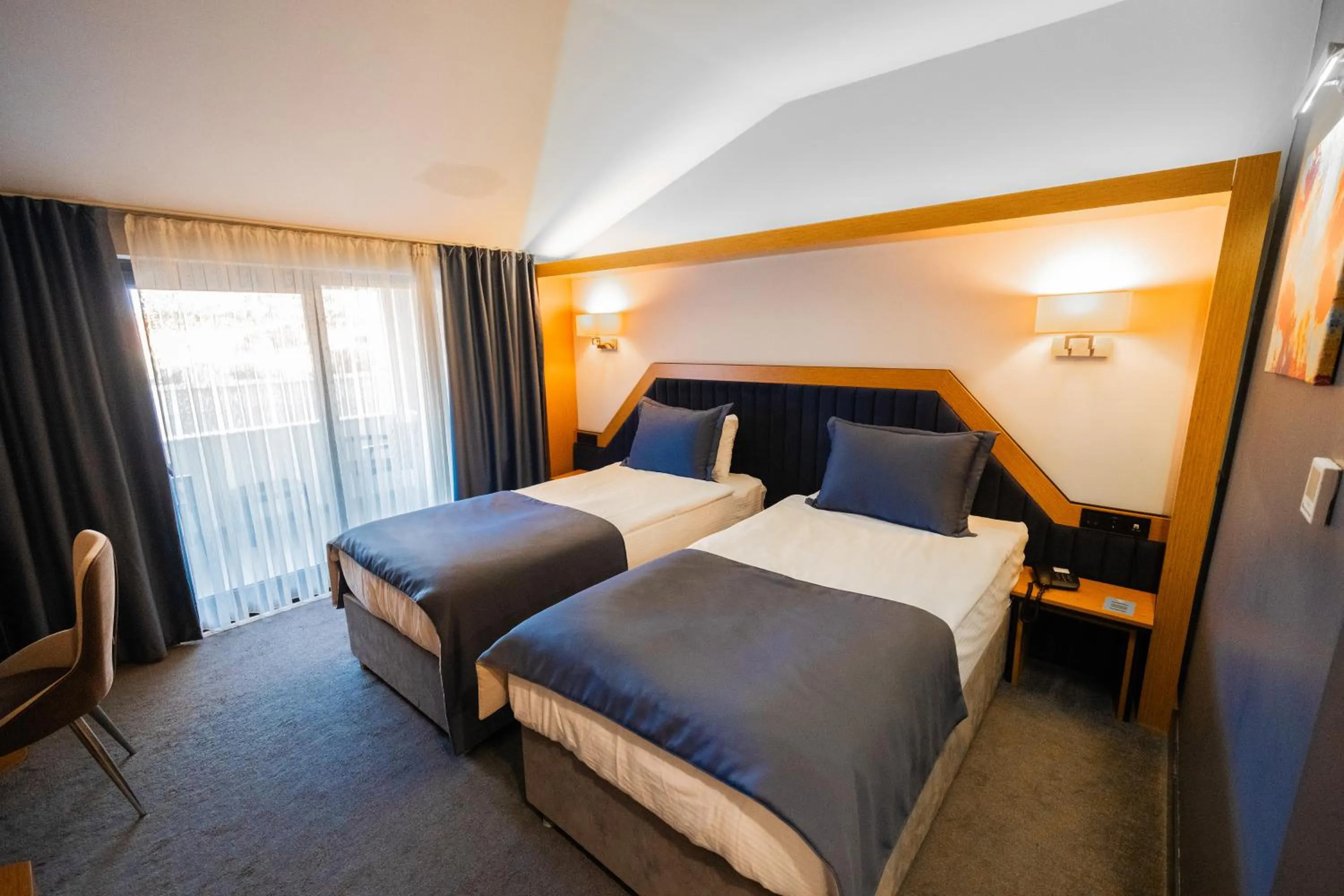 Bed in Roof 264 Hotel & Suites