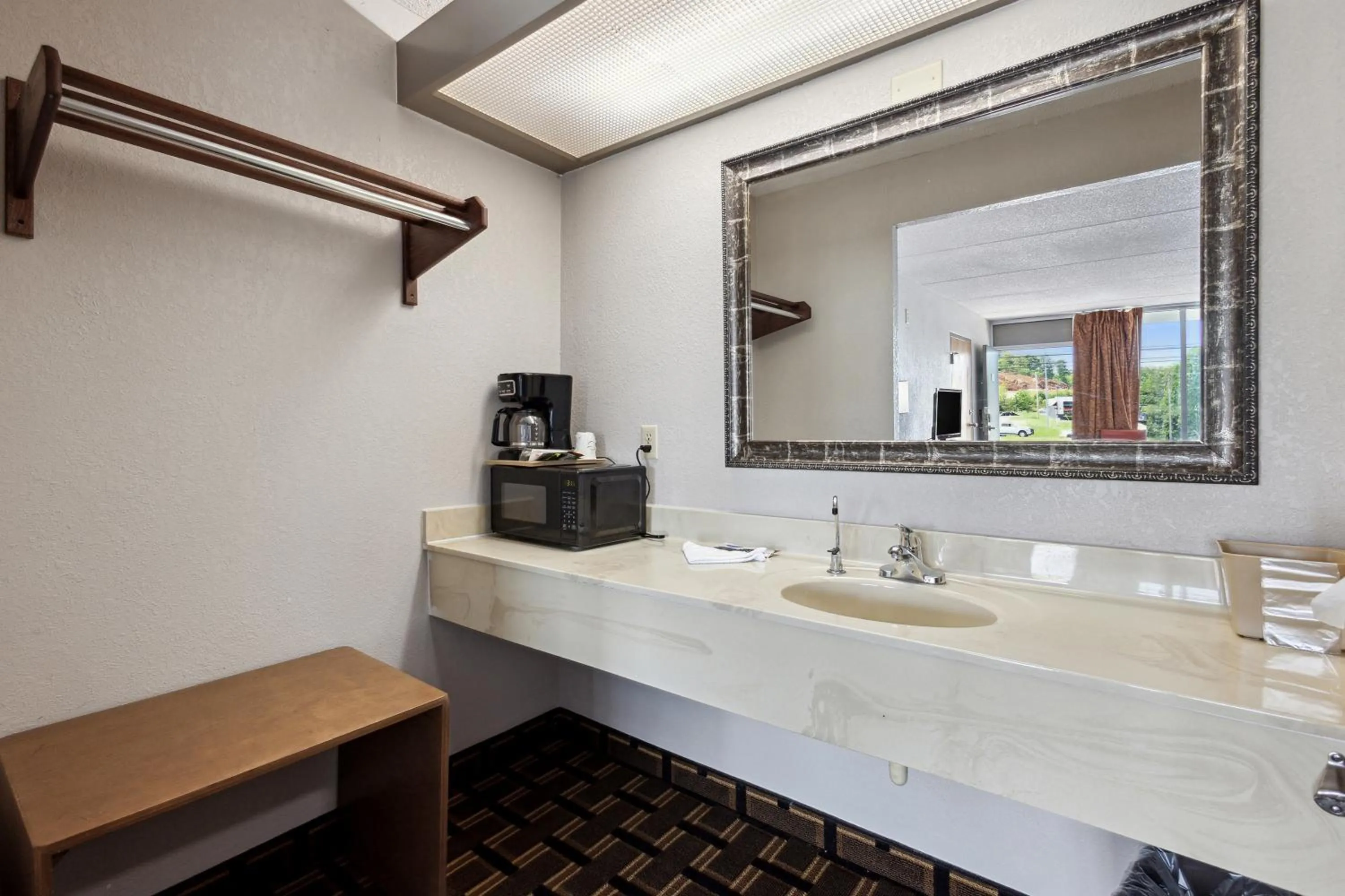 Bathroom in Relax inn by OYO Greeneville Near Hwy US-321