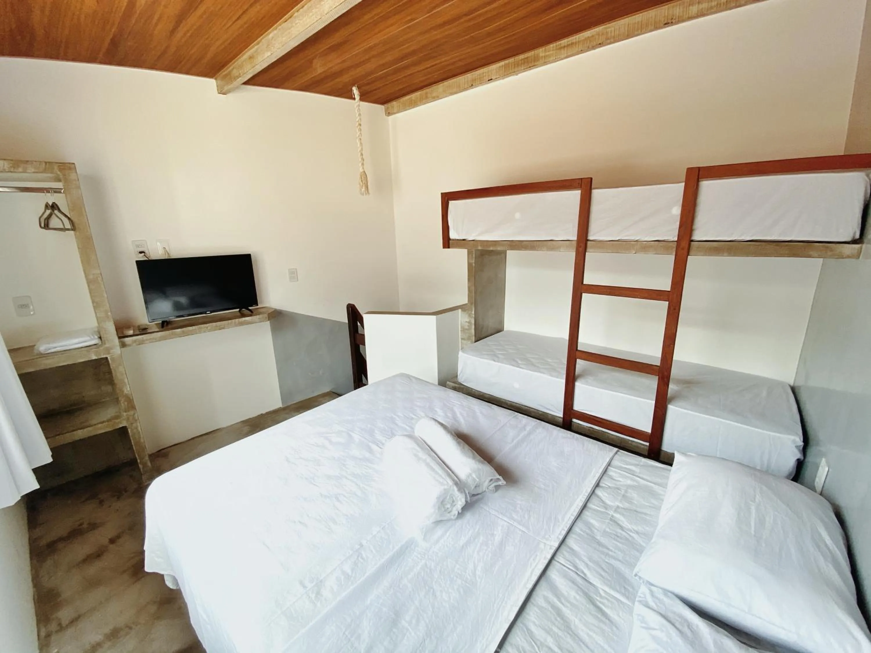 Bed in Pousada Primeira Praia Suítes