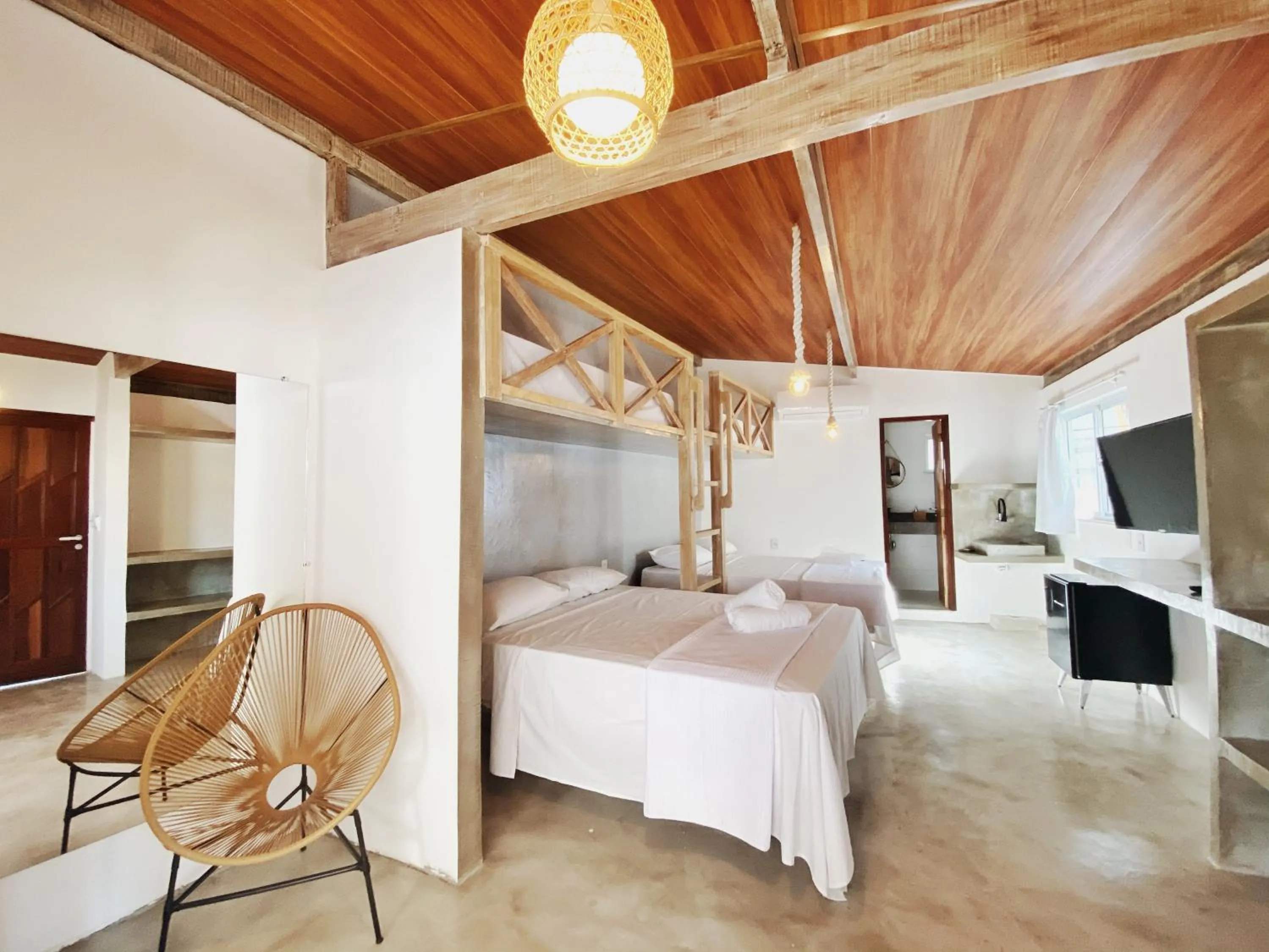 Bed in Pousada Primeira Praia Suítes