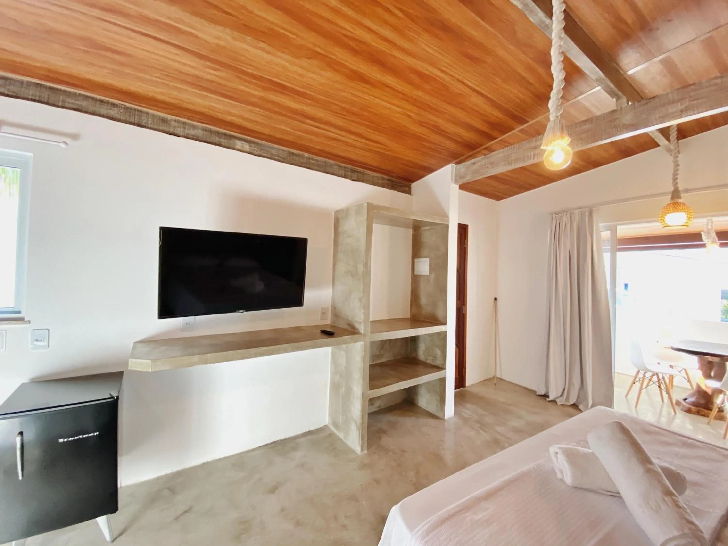 Bed in Pousada Primeira Praia Suítes