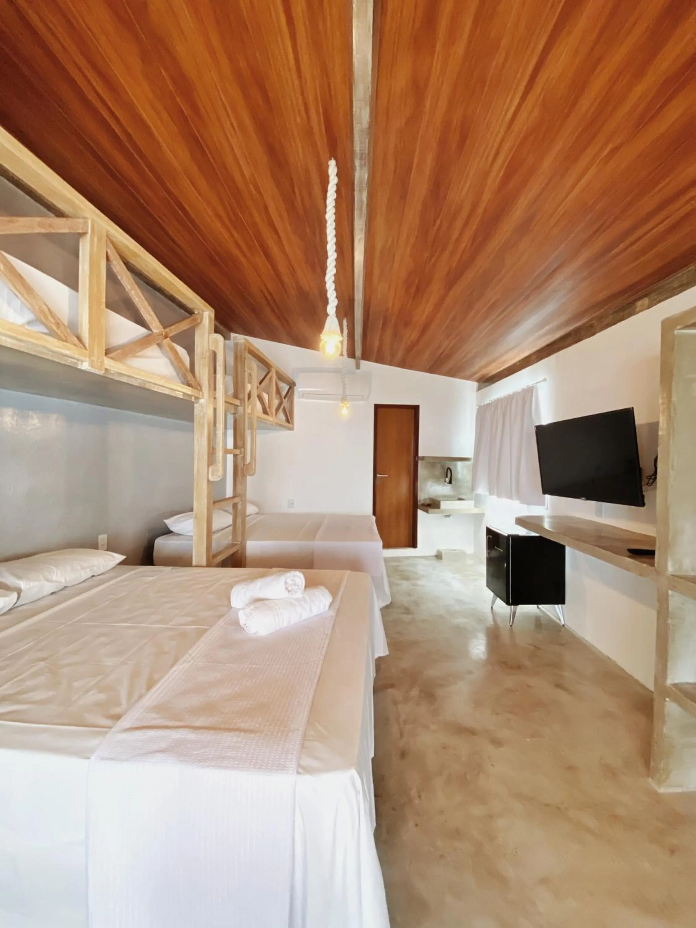 Bed in Pousada Primeira Praia Suítes