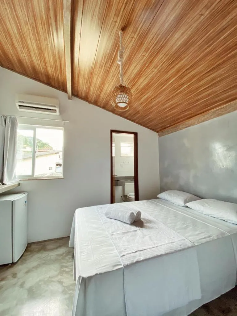 Bed in Pousada Primeira Praia Suítes