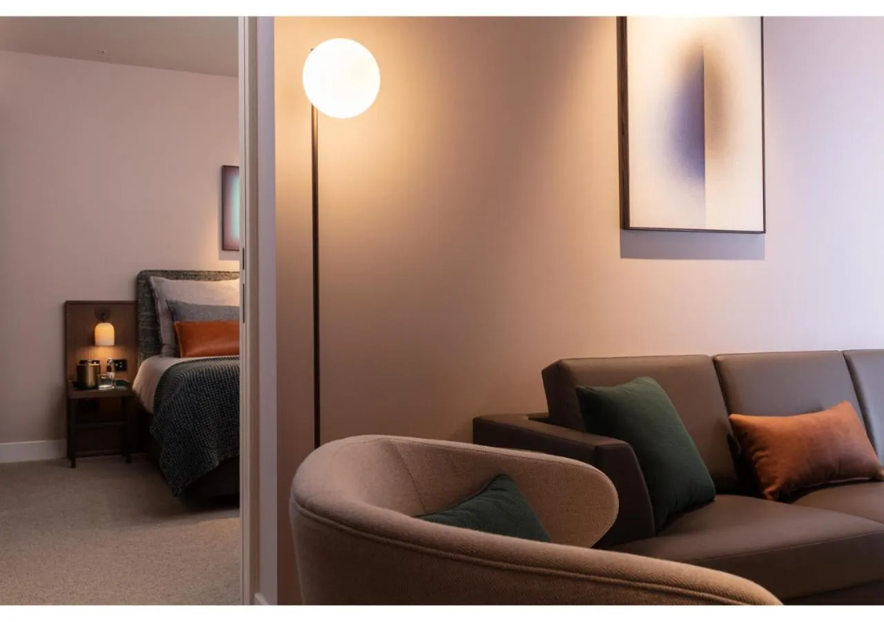 Living room, Bed in Next Hotel Melbourne, Curio Collection by Hilton