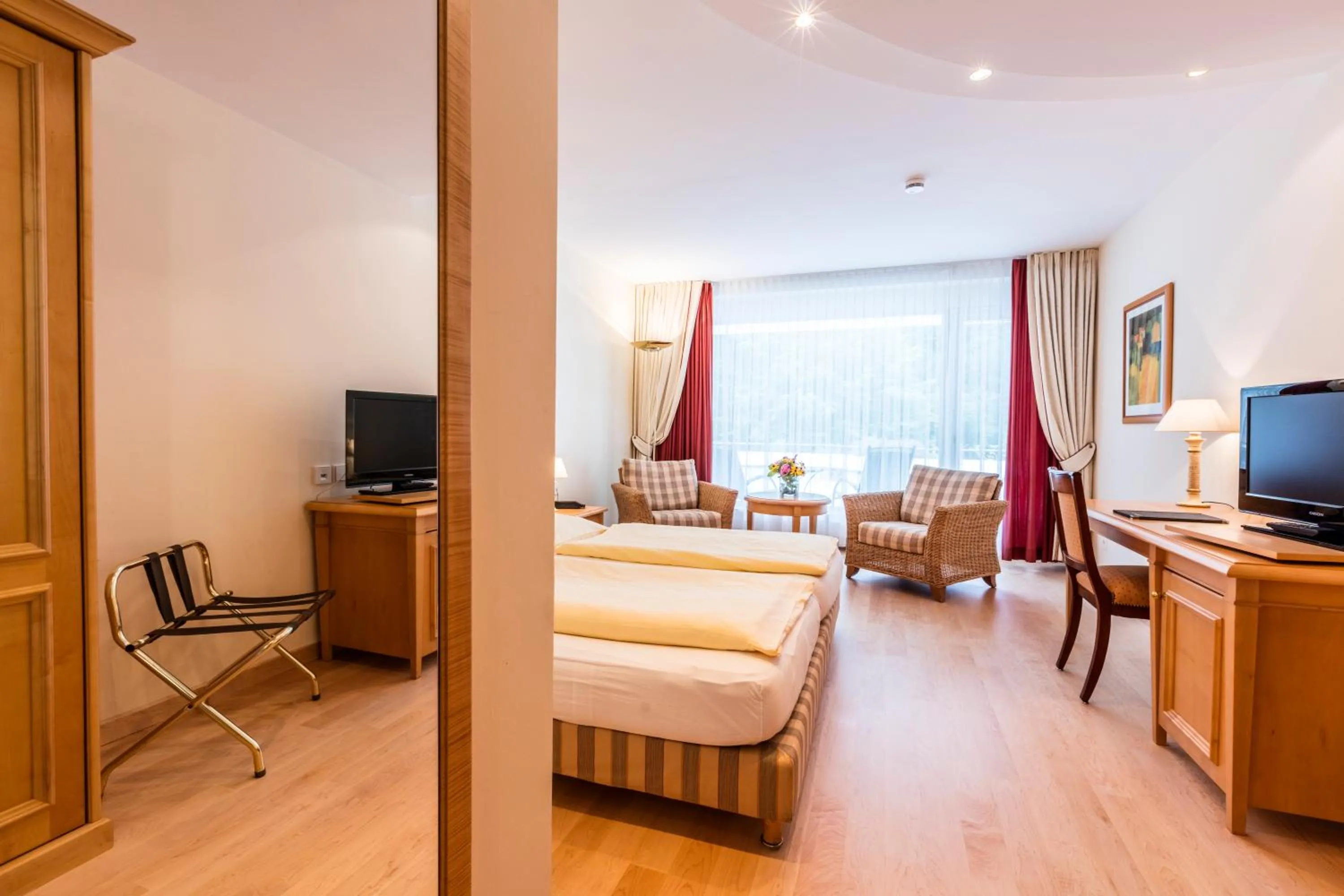 Photo of the whole room, Bed in Waldhotel Bad Sulzburg