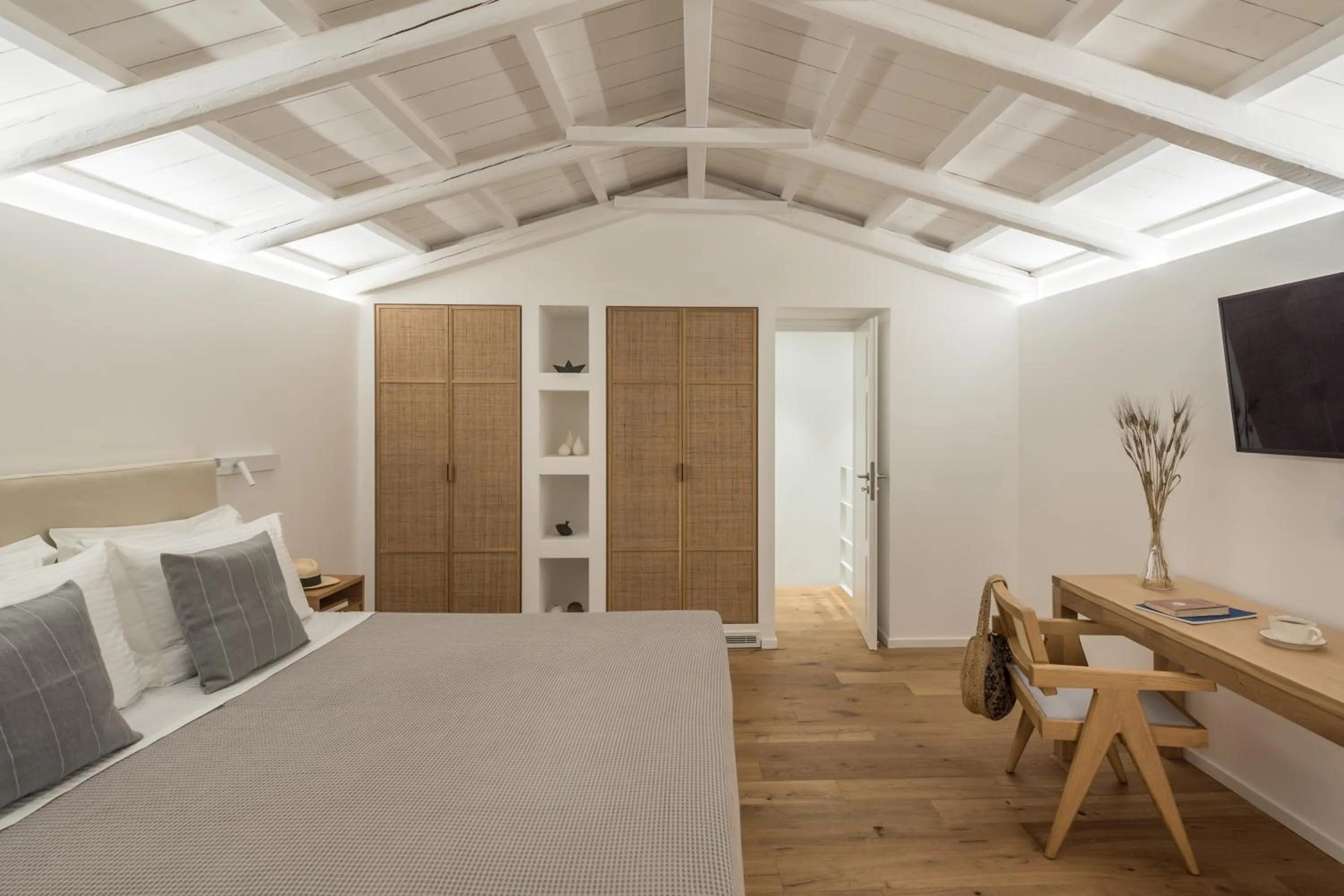 Bed in NESEA Boutique Apartments