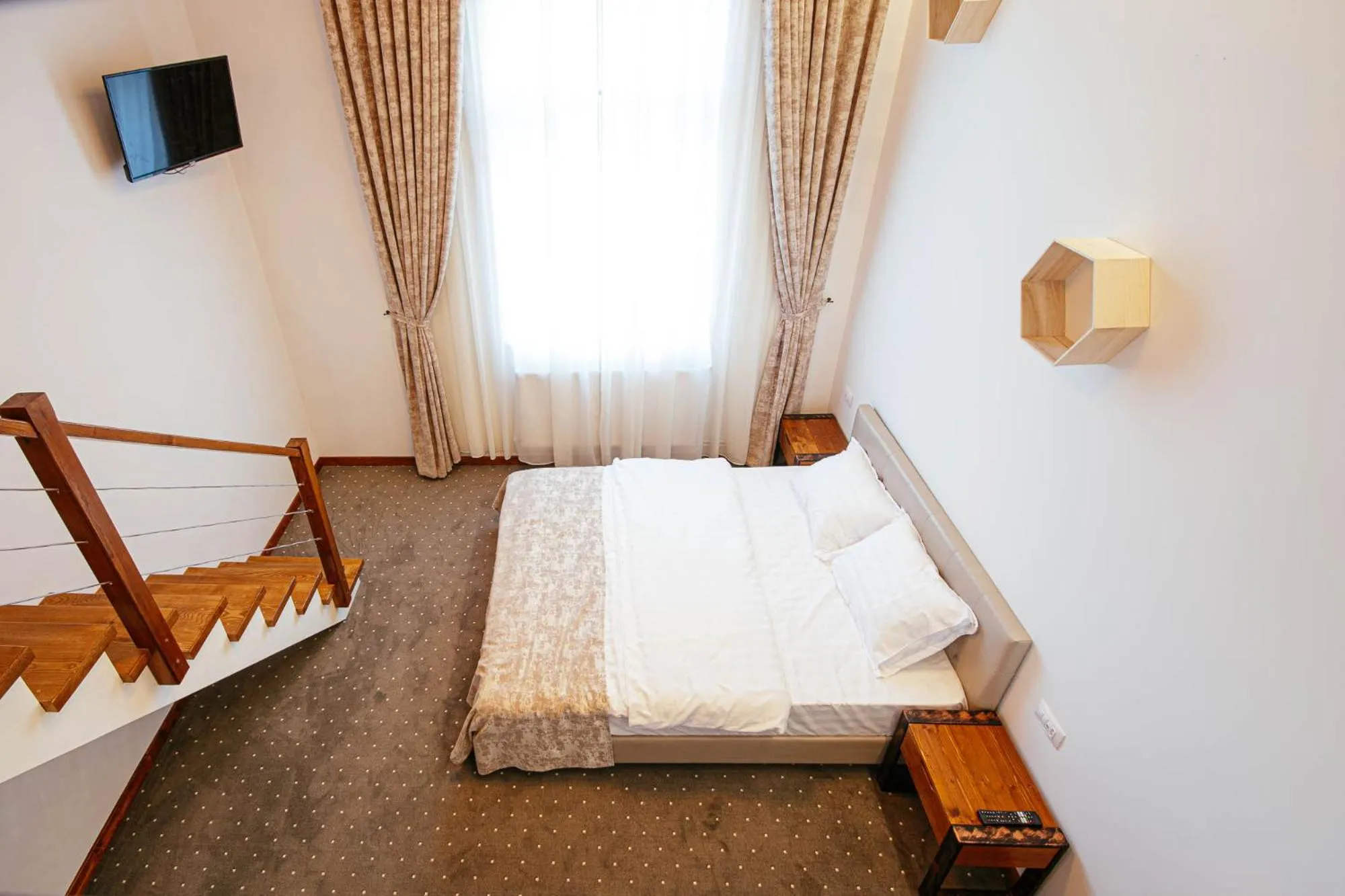 Communal lounge/ TV room, Bed in Buchenland Hotel