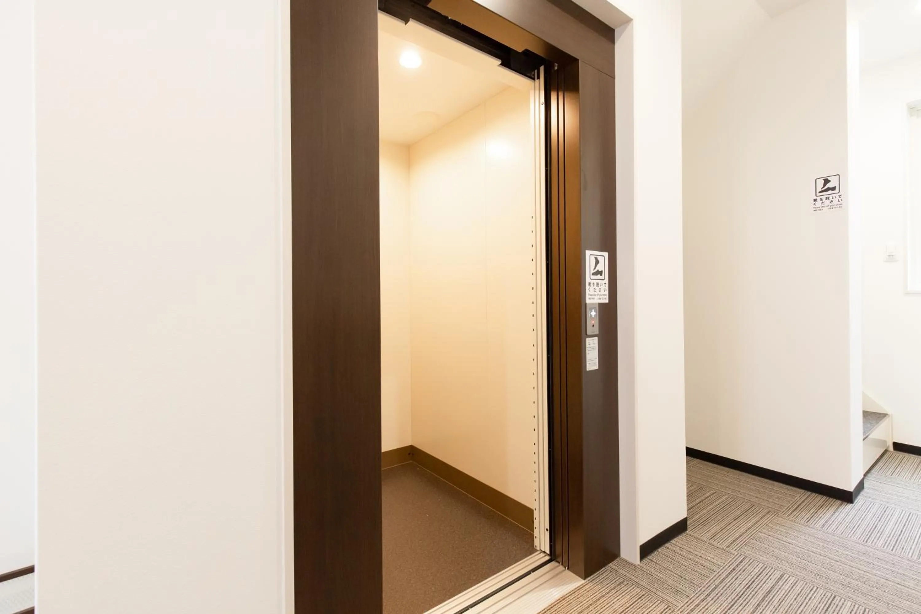 Property logo or sign in Port House Hatsudai