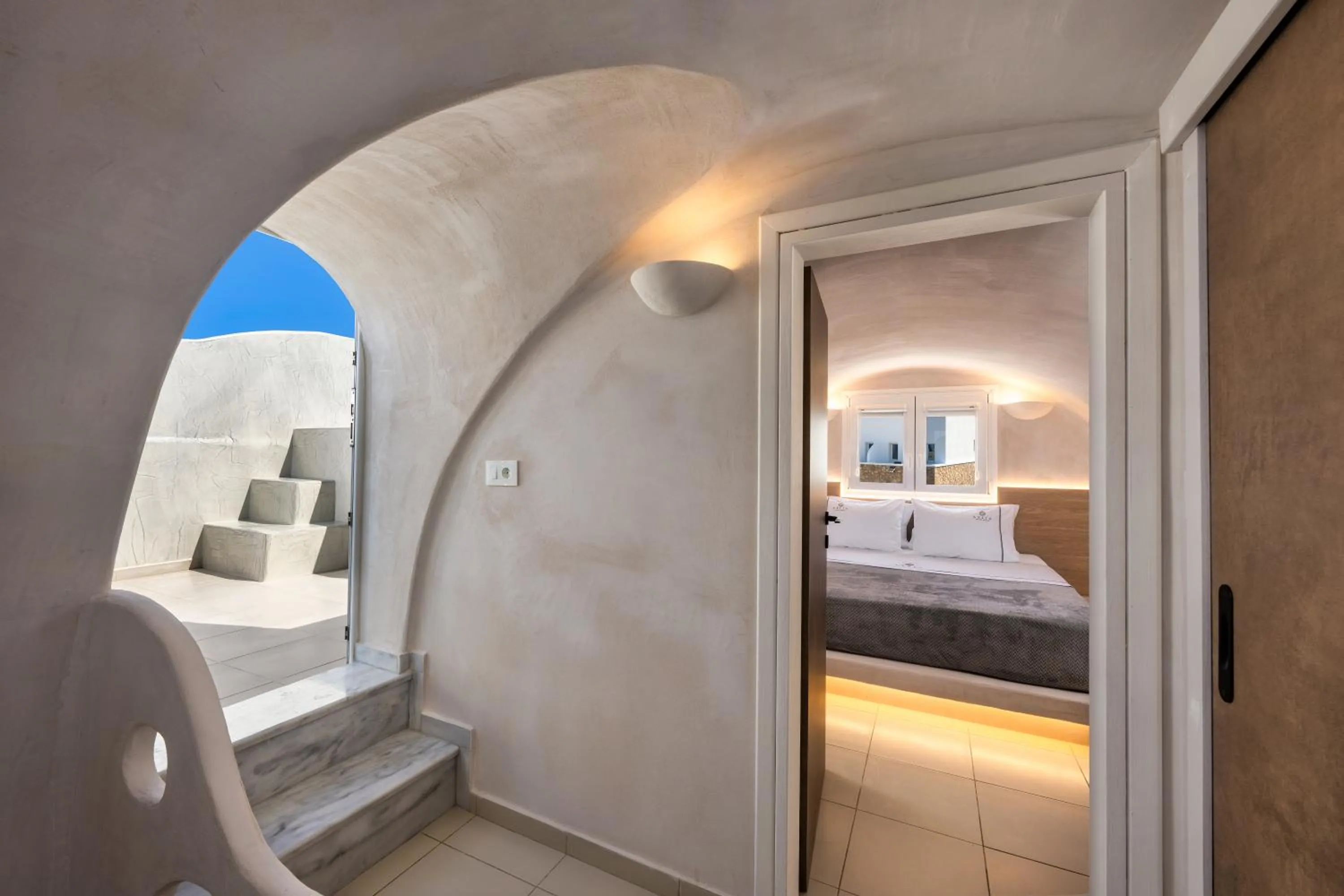 Bed in Aelia Luxury Suites