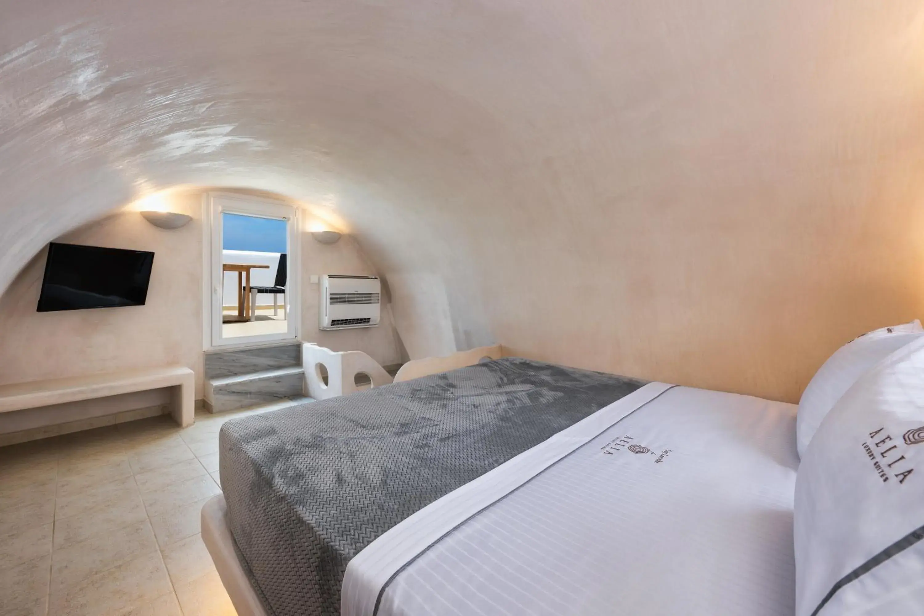 Bed in Aelia Luxury Suites Bed in Aelia Luxury Suites