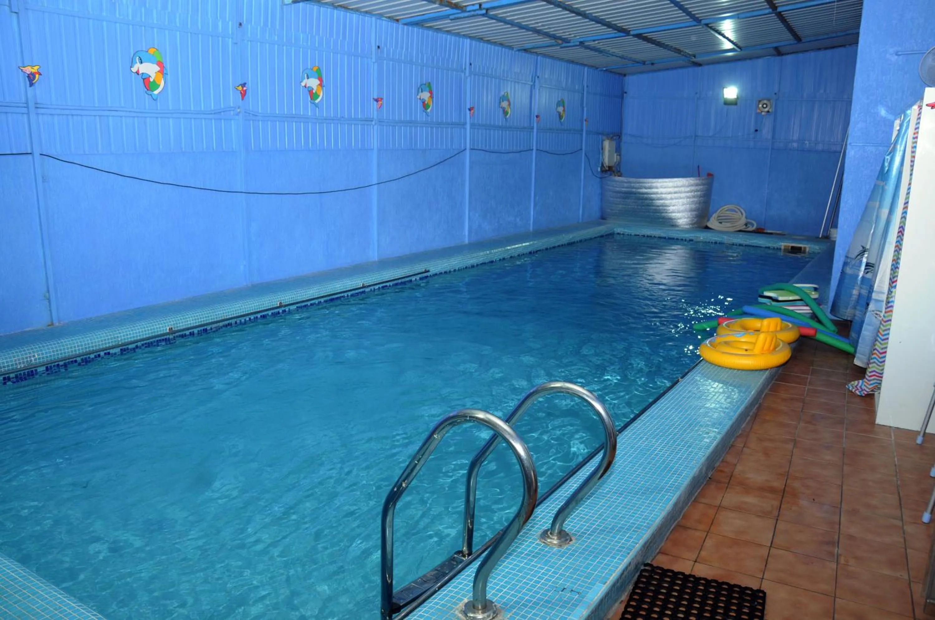 Swimming pool in Arinza Tower Quality Apartments